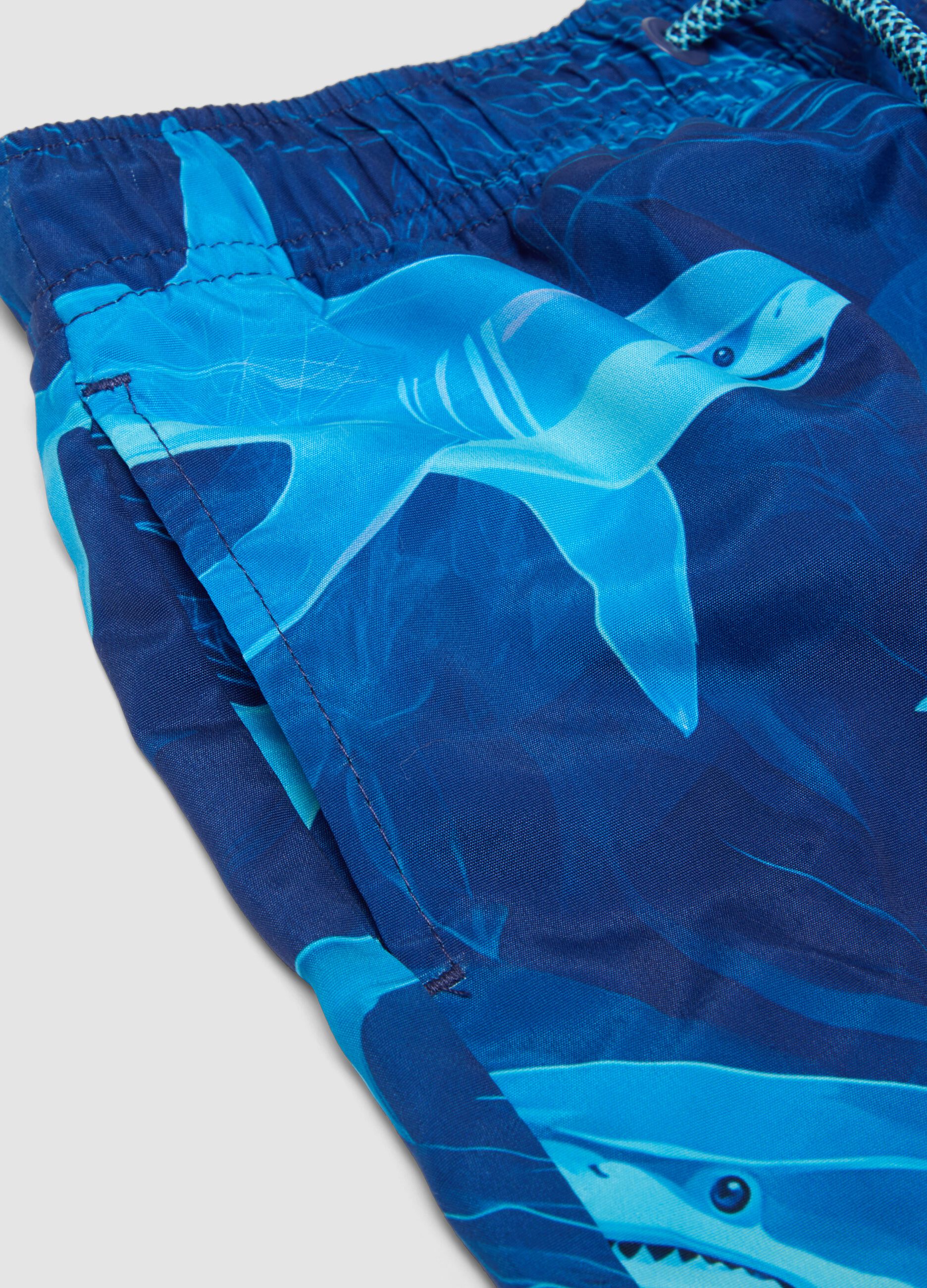 Blue shark-print swim shorts