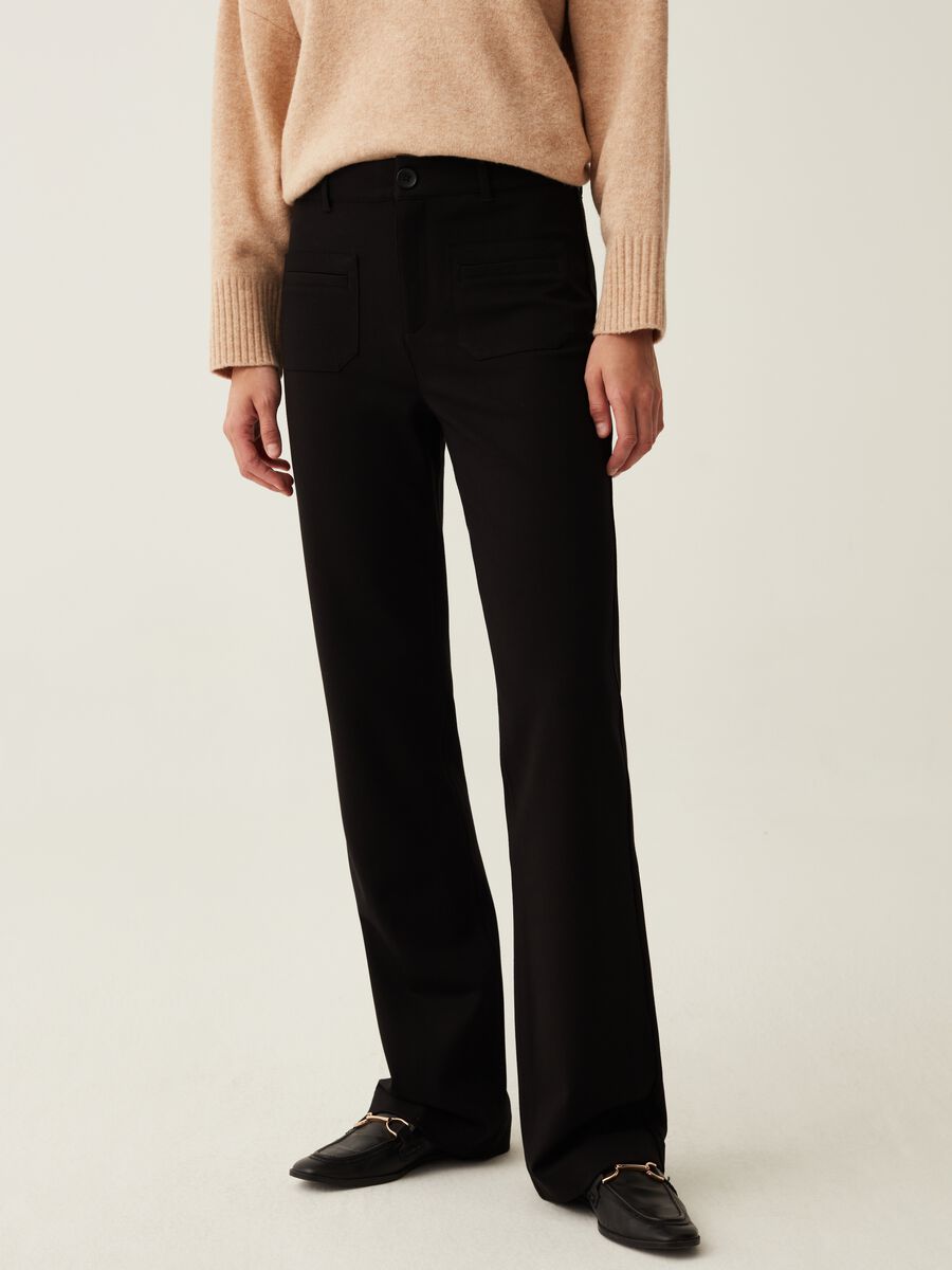 Flare-fit trousers with pockets_0