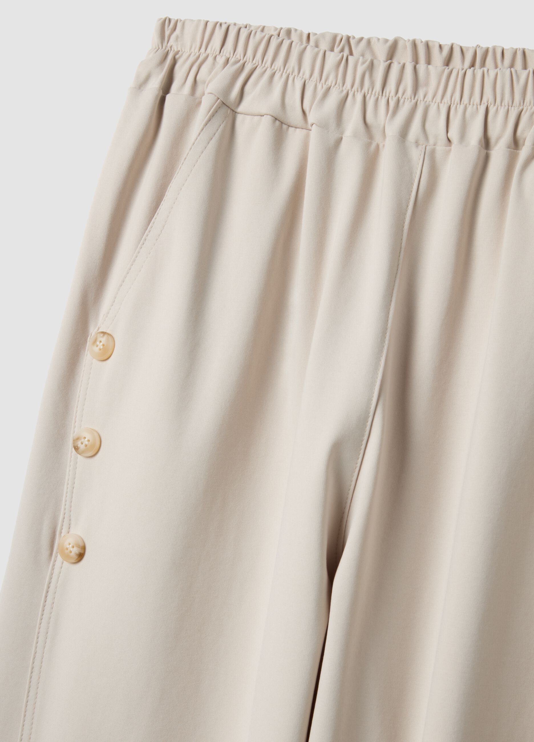 Beige regular-fit stretch cotton trousers with elasticated waist