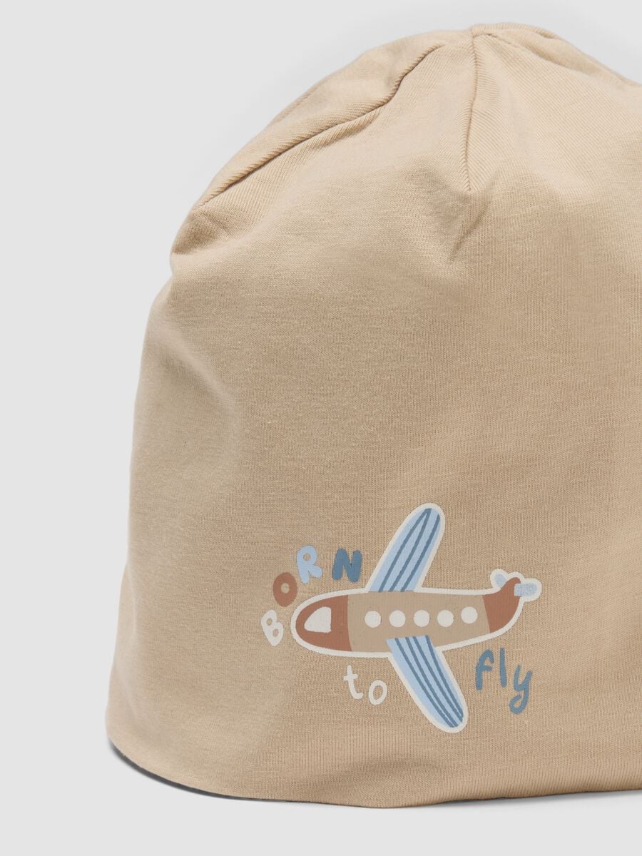 Beige stretch organic cotton baby hat with aeroplane print_2