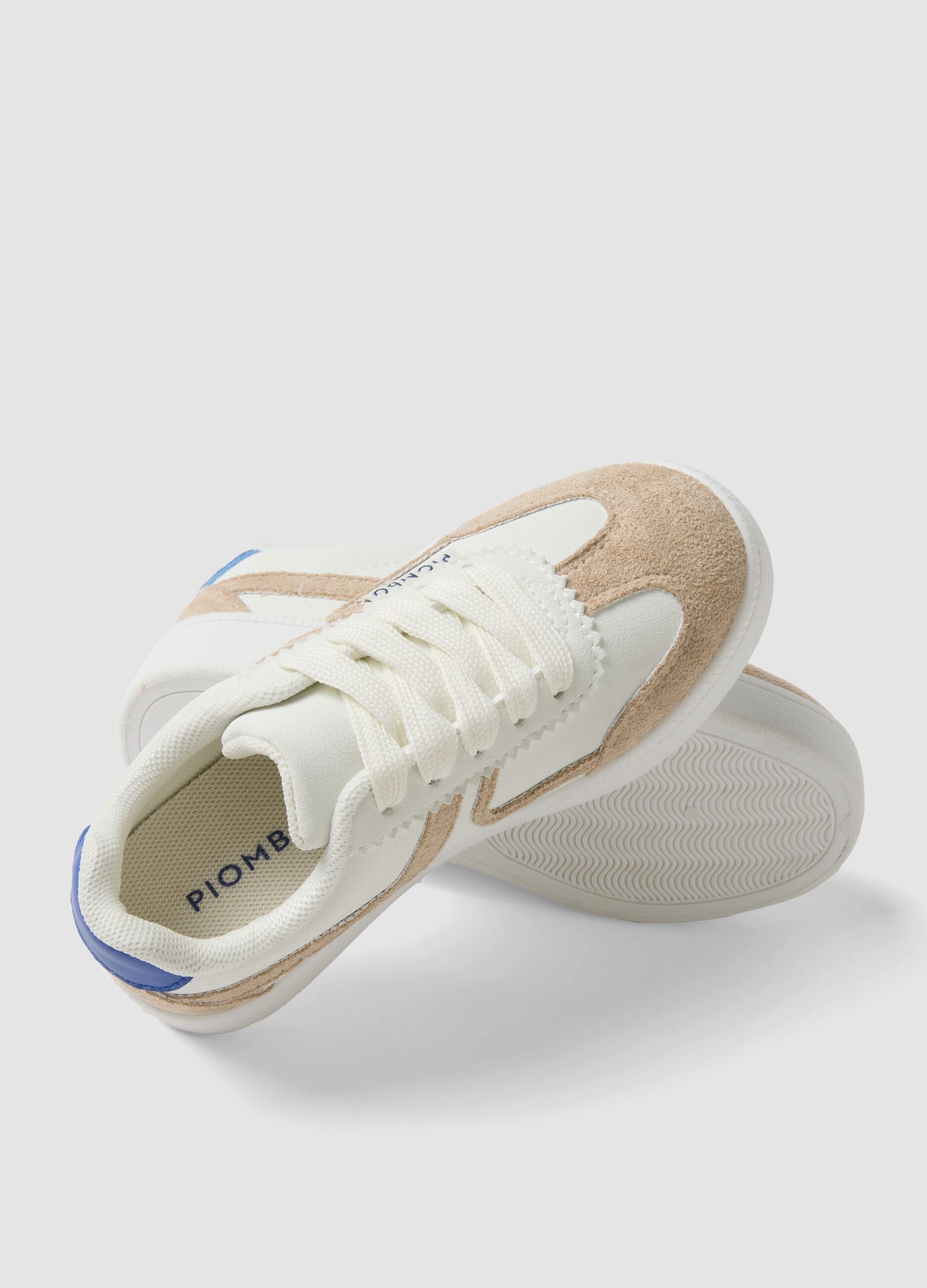 White and beige children's sneakers