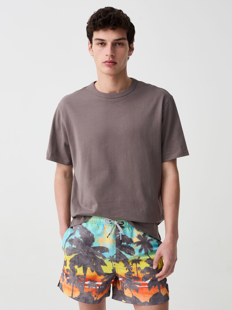 Swimming trunks with tropical print_0