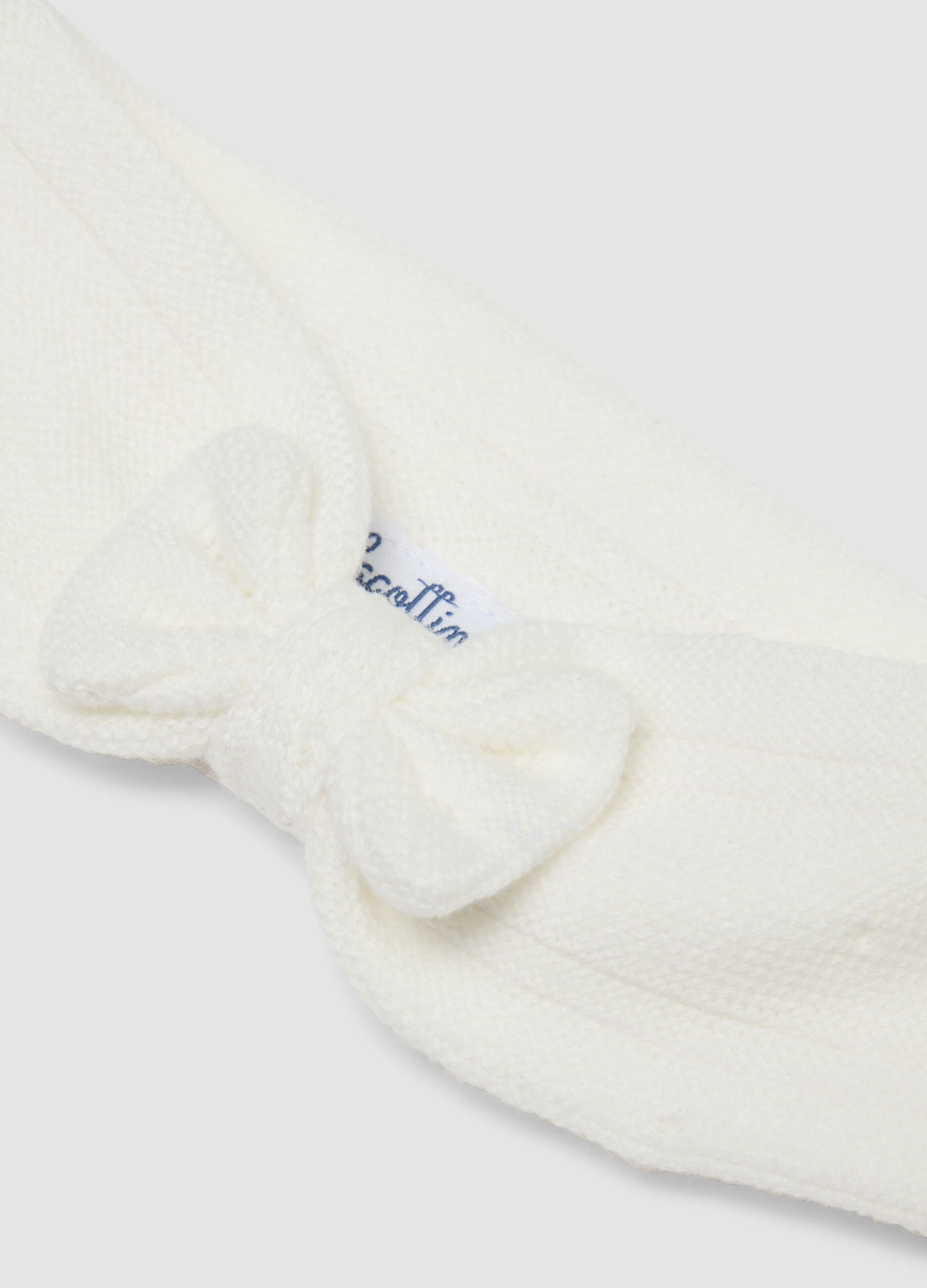 White organic cotton headband with knitted bow