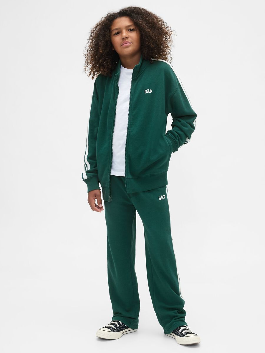 Green knitted trousers for children_0
