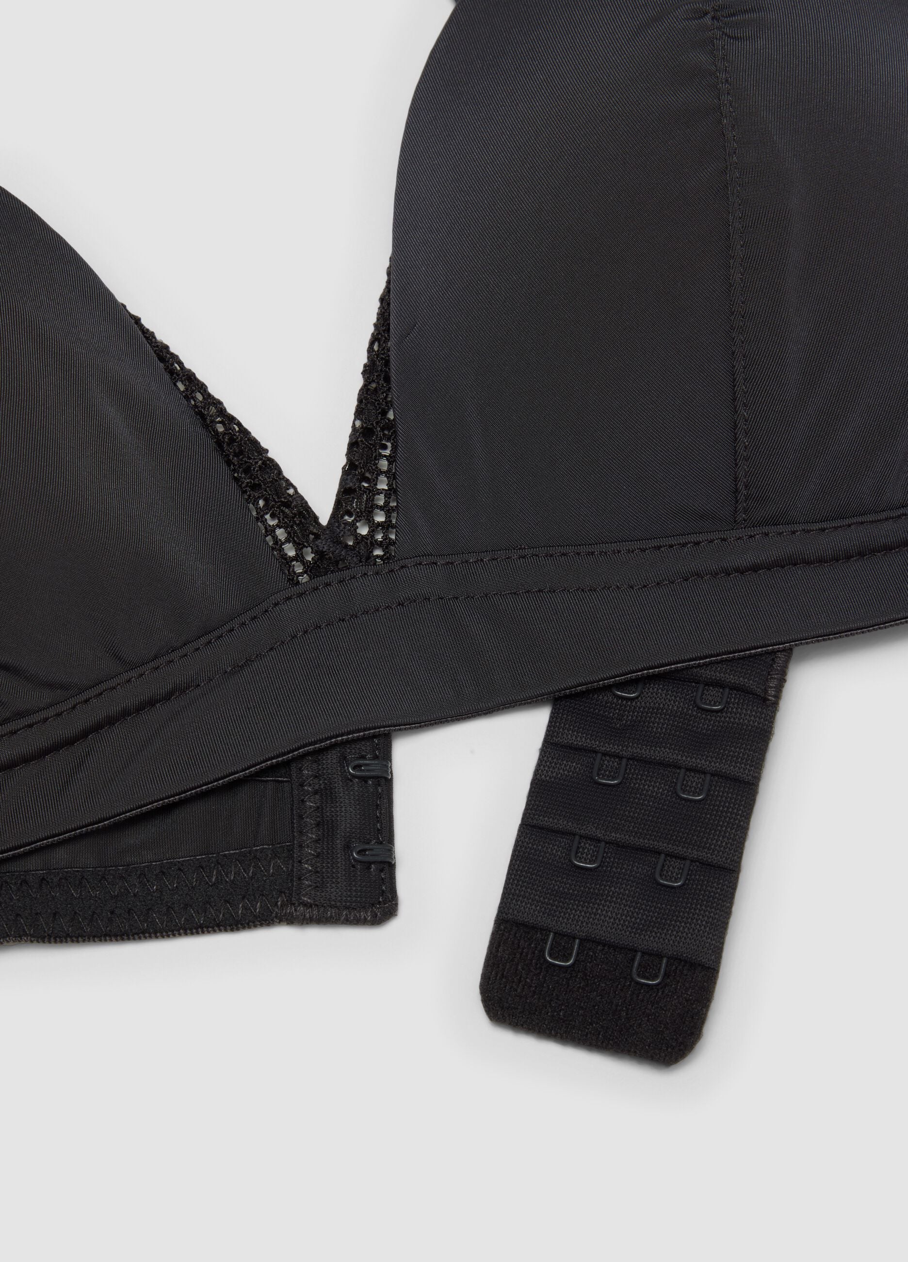 Black triangle bra in stretch fabric with removable padding