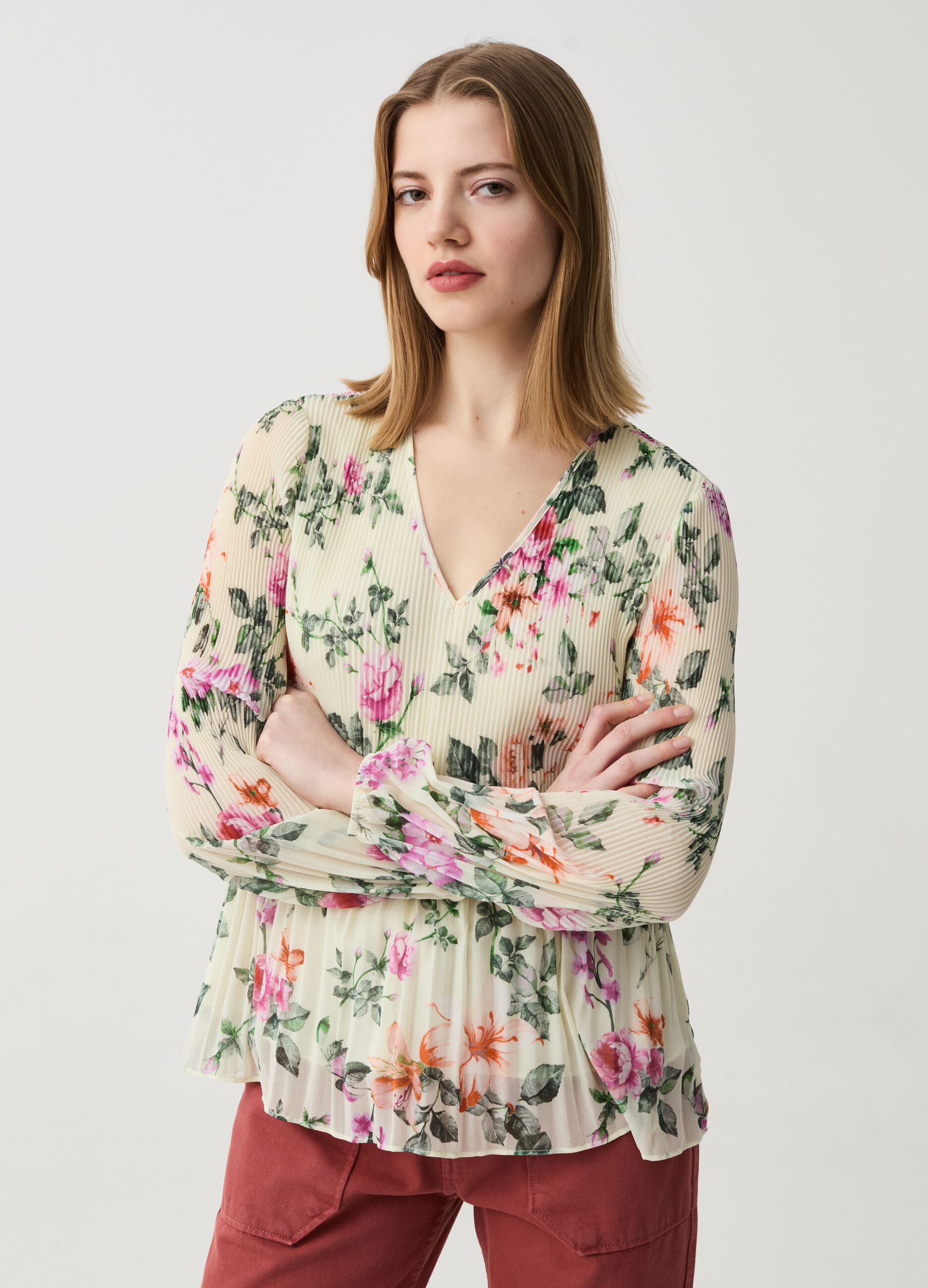 Pleated blouse with floral print