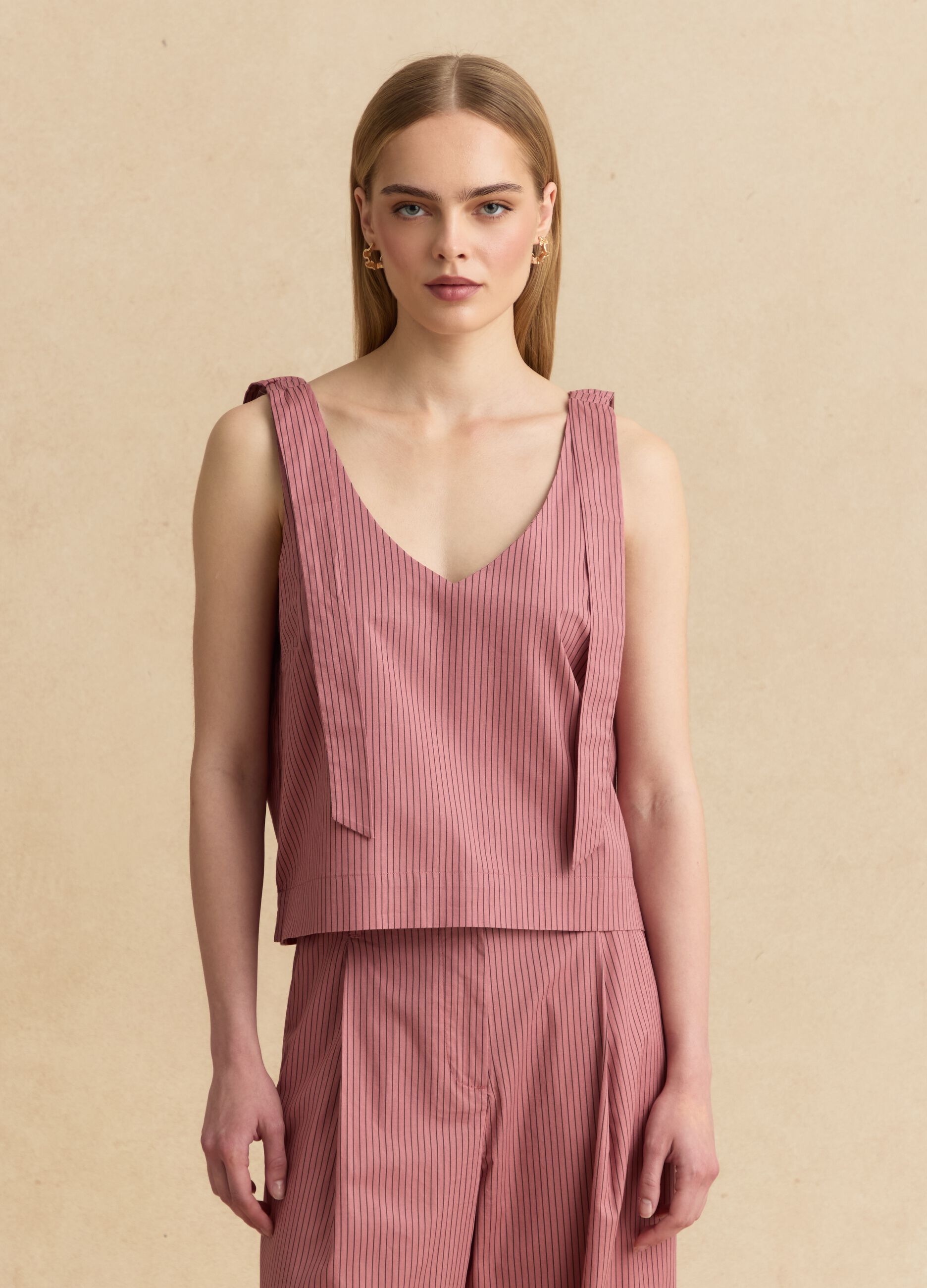 Pink stretch-cotton blouse with tie shoulder straps
