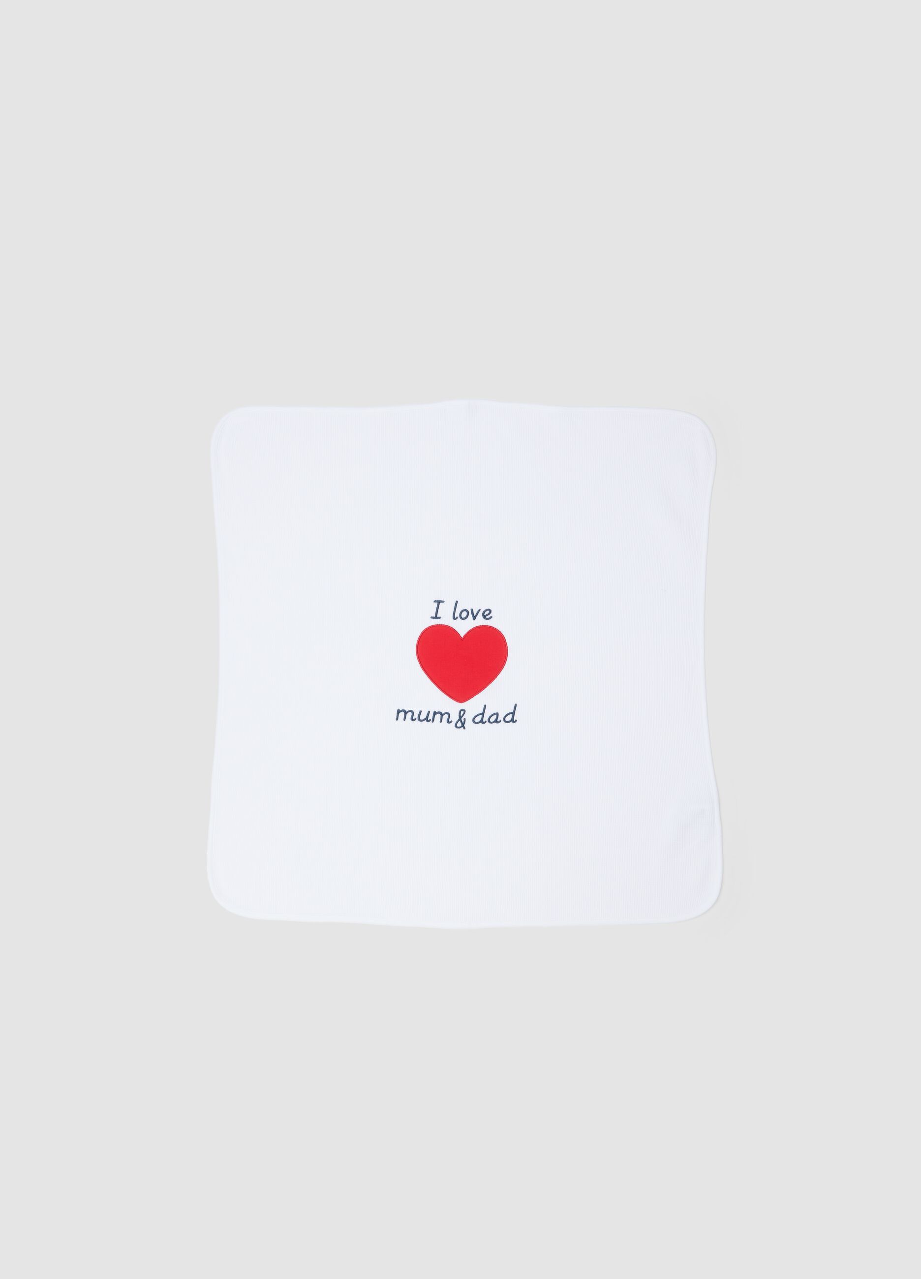 White 100% cotton baby blanket with red heart