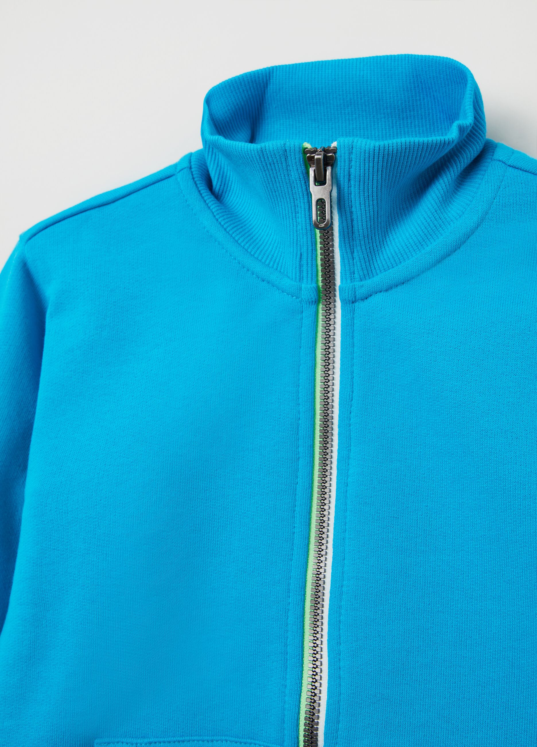 Full-zip plush top with high neck