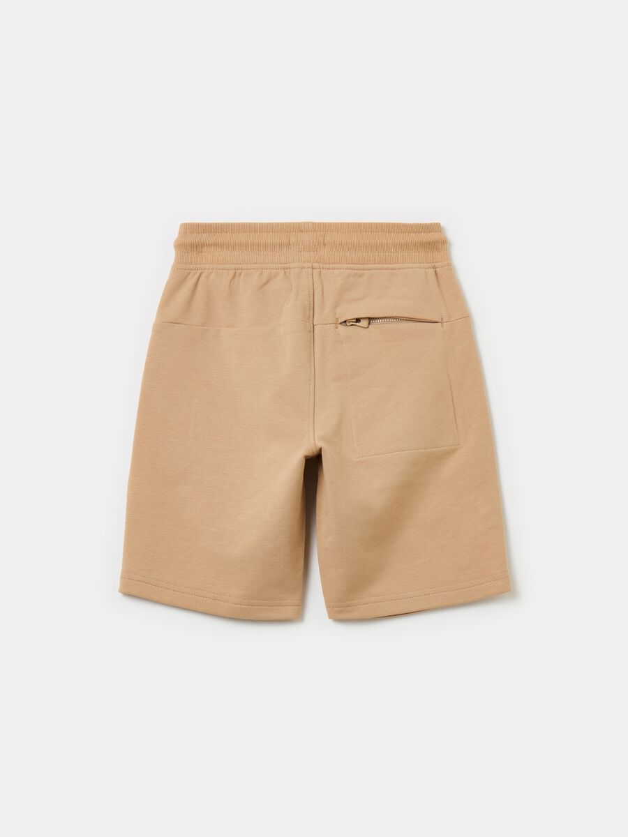 Fleece Bermuda shorts with pockets and drawstring_1