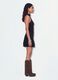 Schwarzes Stretchkleid mit Stehkragen und Volantabschluss_1