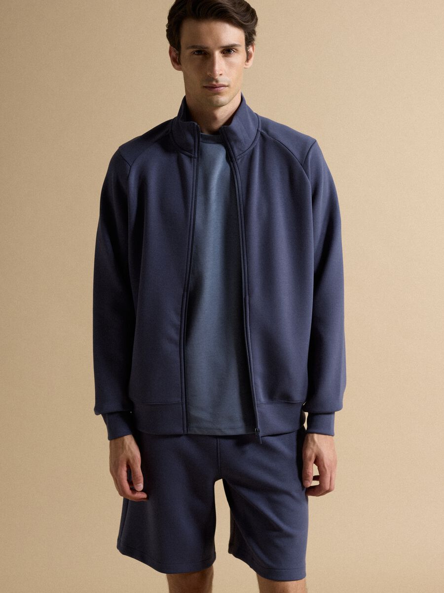 Blaue Full-Zip-Jacke mit Kragen aus elastischem Easy-Dry-Gewebe, Regular Fit_0