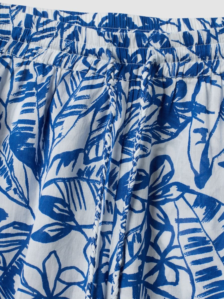 Blue and white organic cotton trousers with floral print_5
