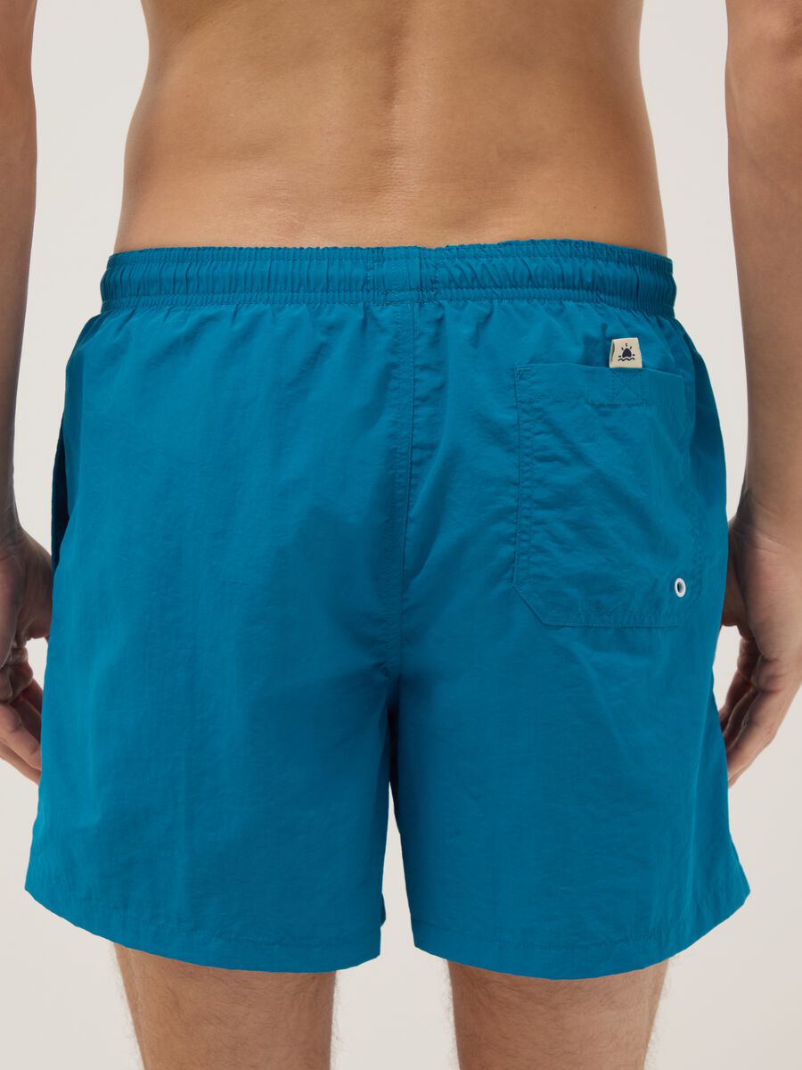 Blue swim shorts with elasticated waist_2