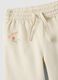 Beige wide-leg pure cotton trousers for baby girls with embroidered detailing_2