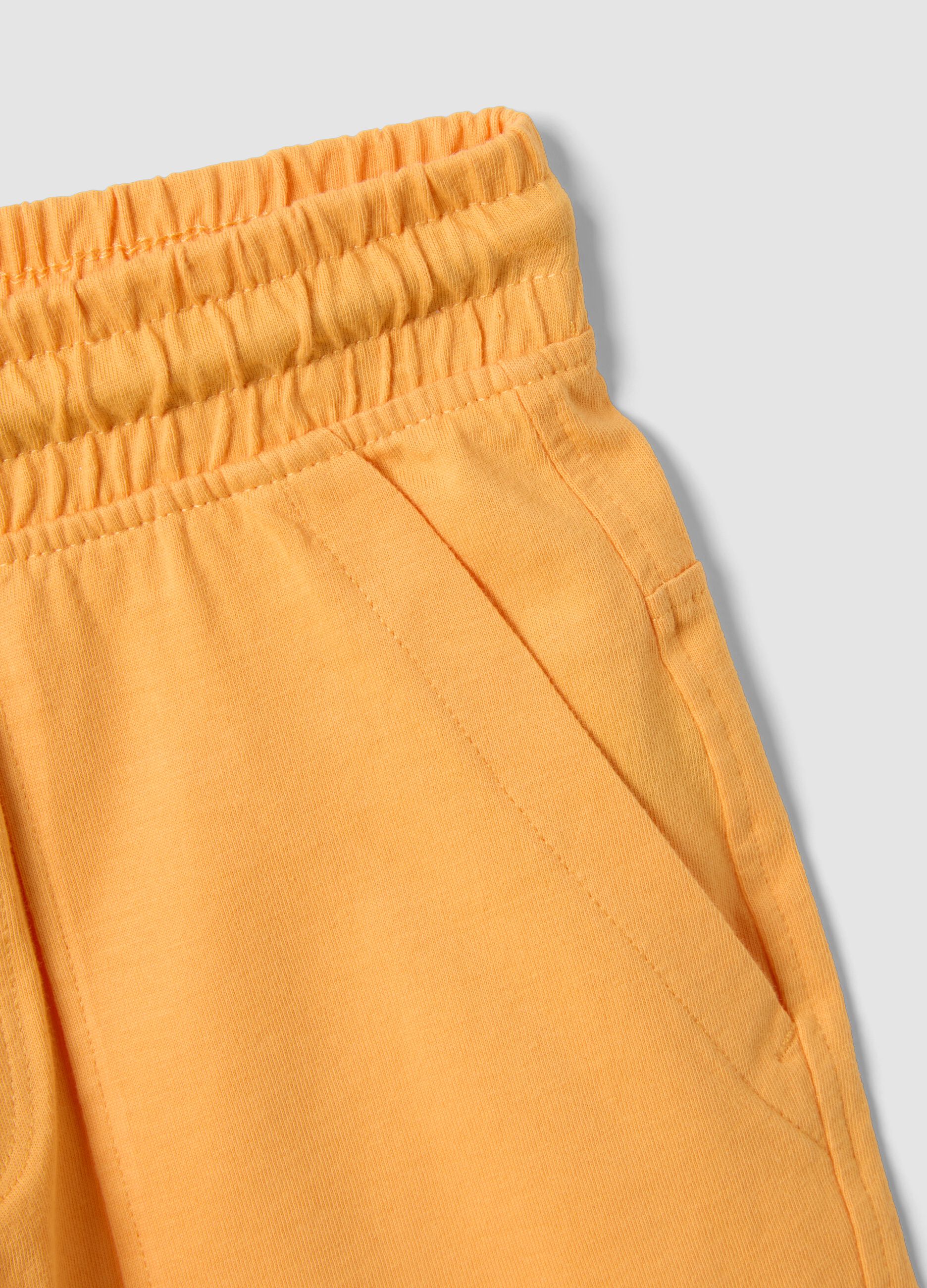 Orange organic cotton shorts with elasticated waistband