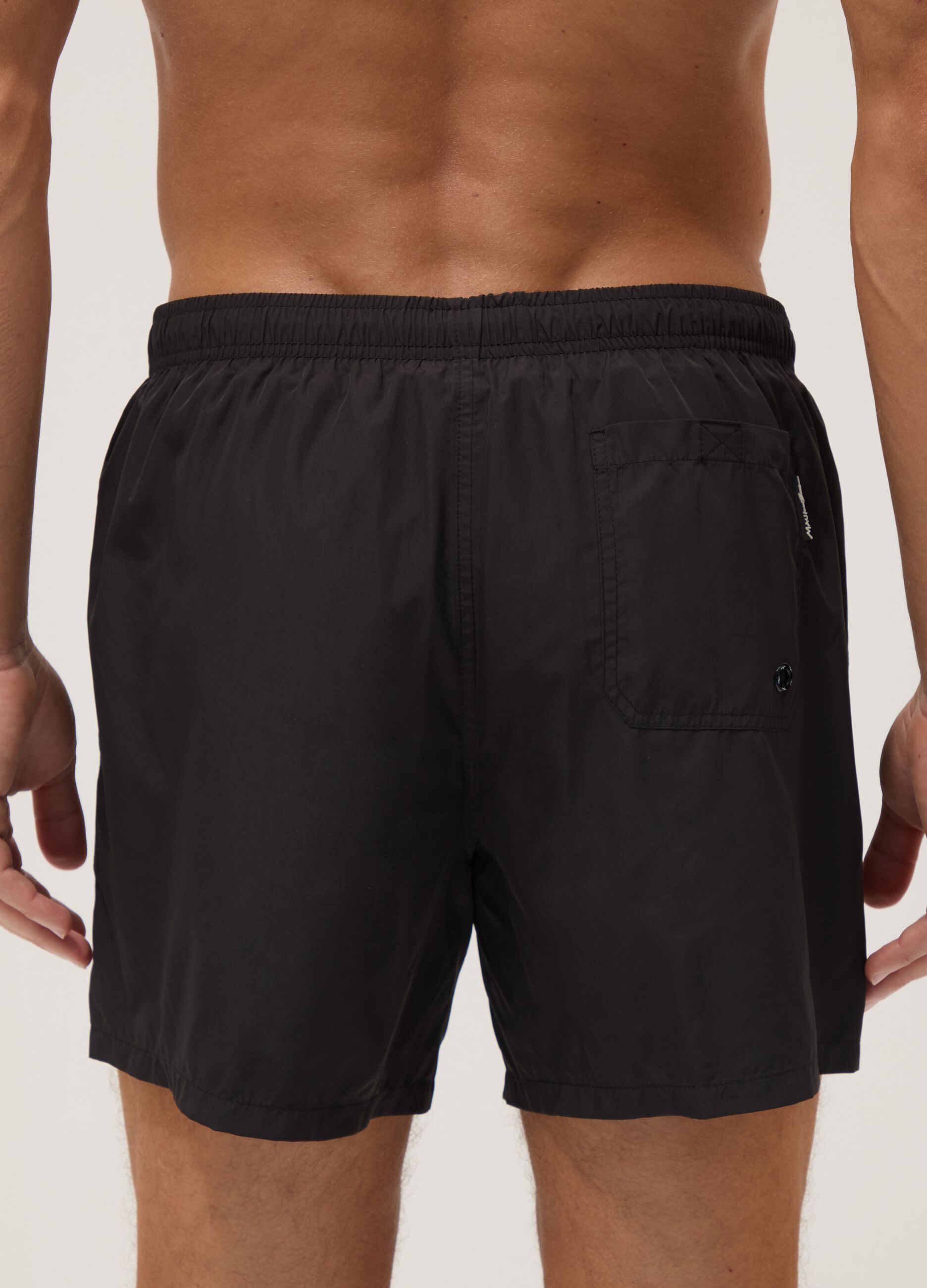 Black swim shorts with elasticated waistband