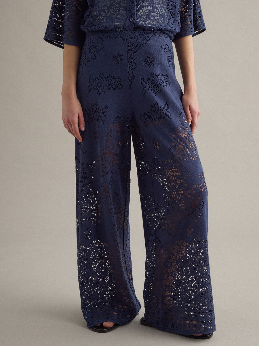 Wide leg blue cotton blend trousers with perforated texture_1
