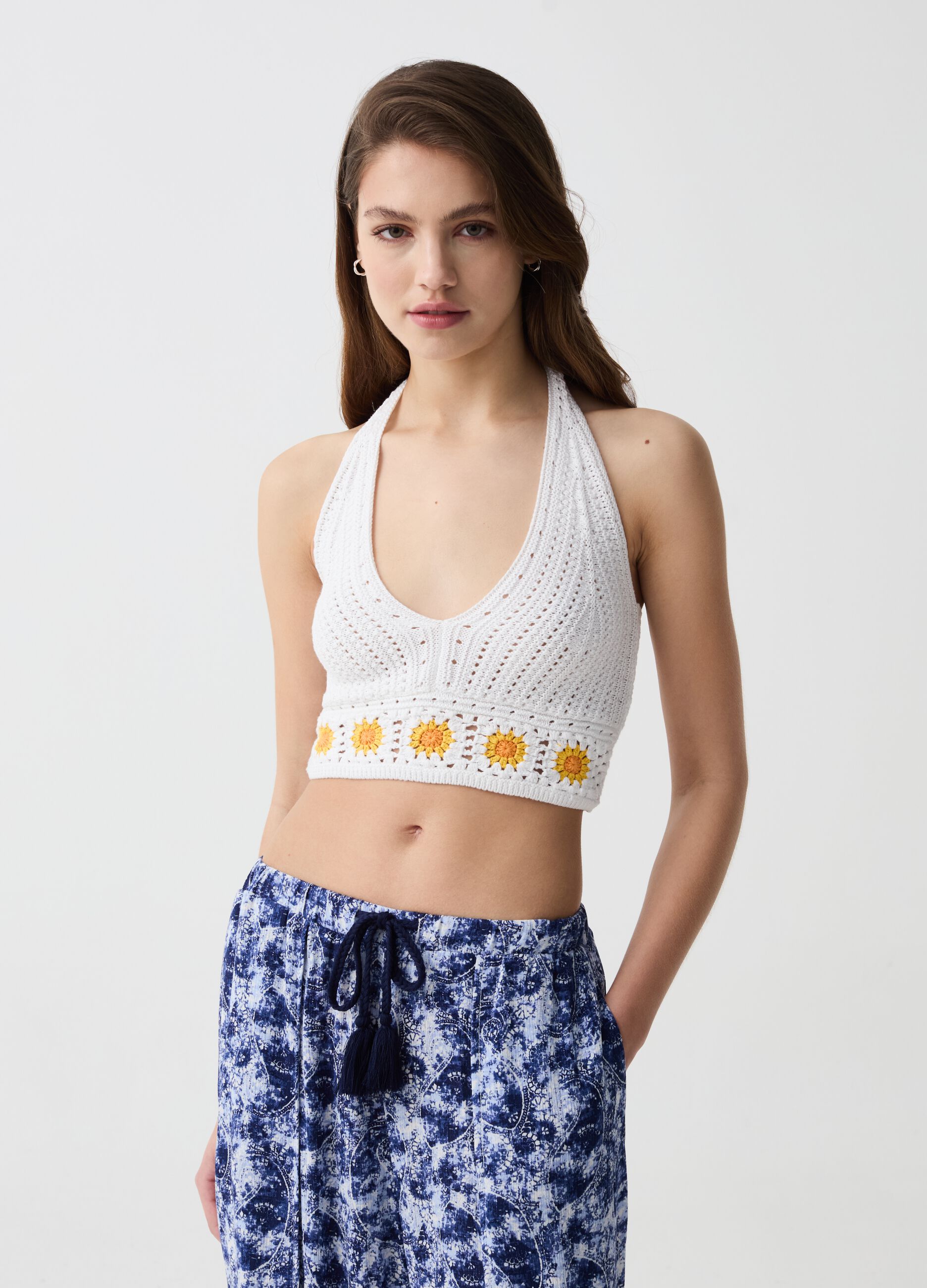 Crochet crop top with flowers embroidery
