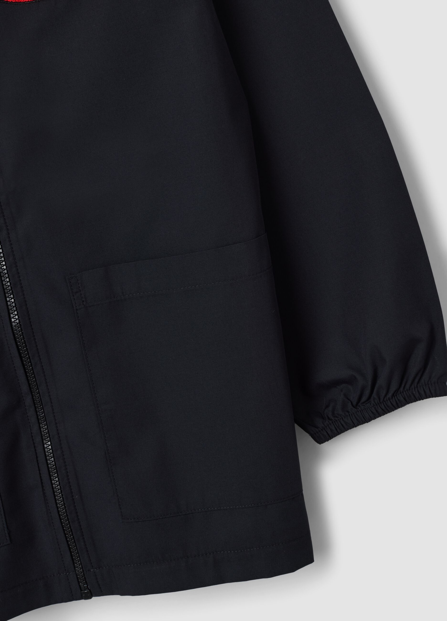 Black school apron with zip and go-kart embroidery for boys