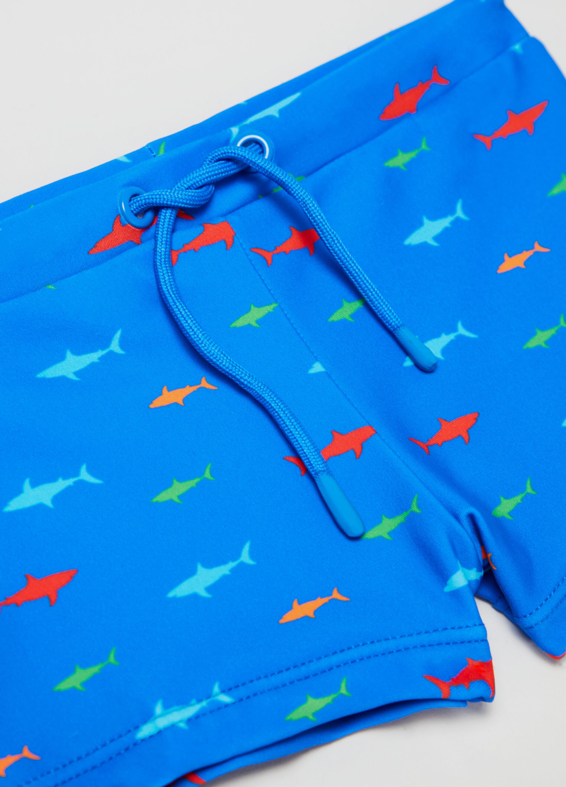 Swimming trunks with sharks print