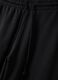 Pantaloni jogger neri baggy fit in puro cotone_1