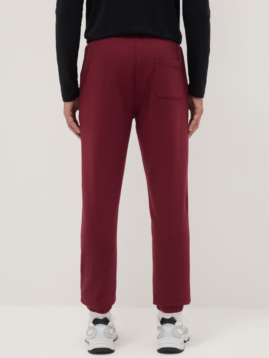 Red regular fit jogger trousers in cotton blend_2