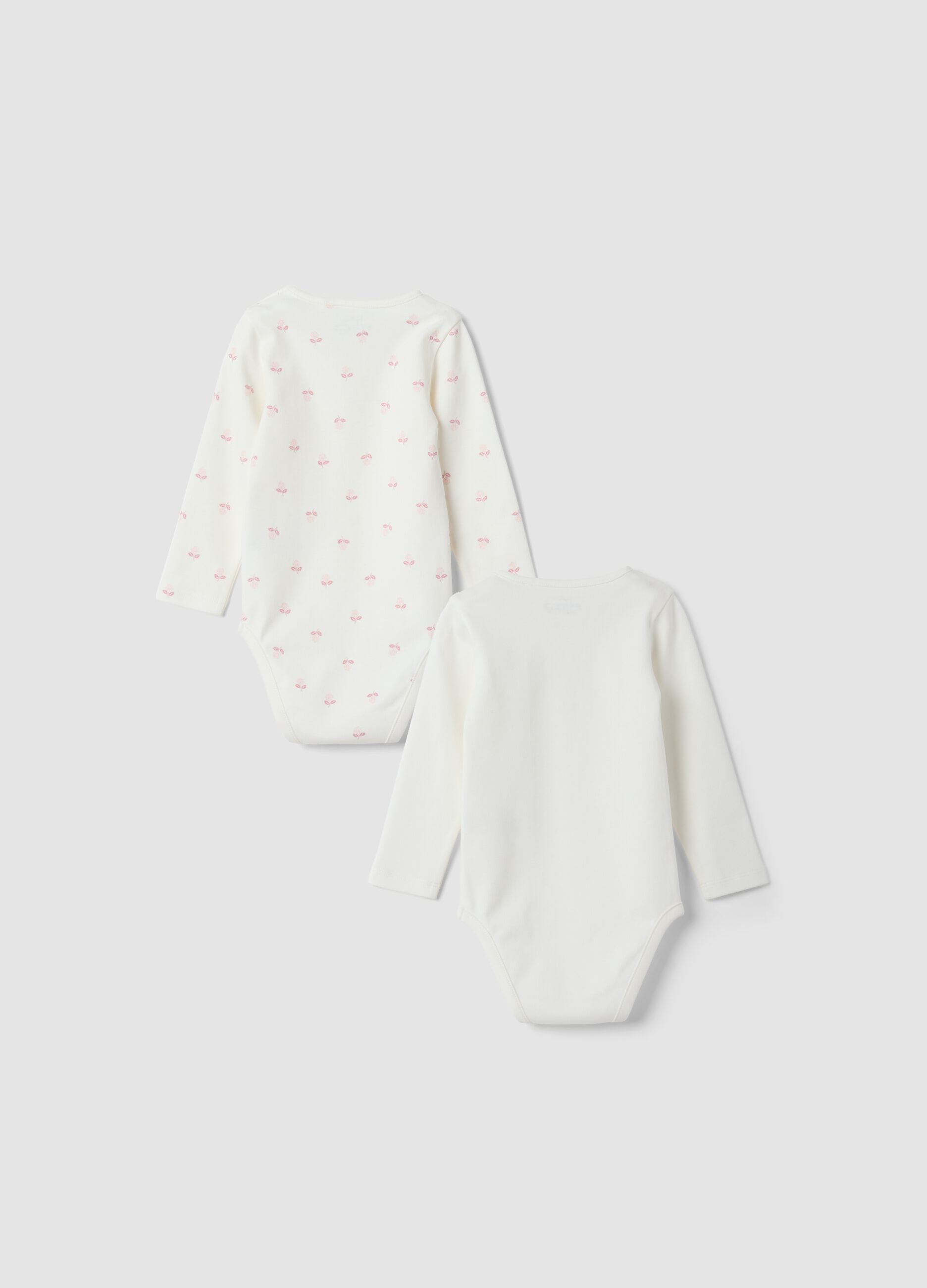 2-pack white organic cotton crew-neck bodysuits for baby girl