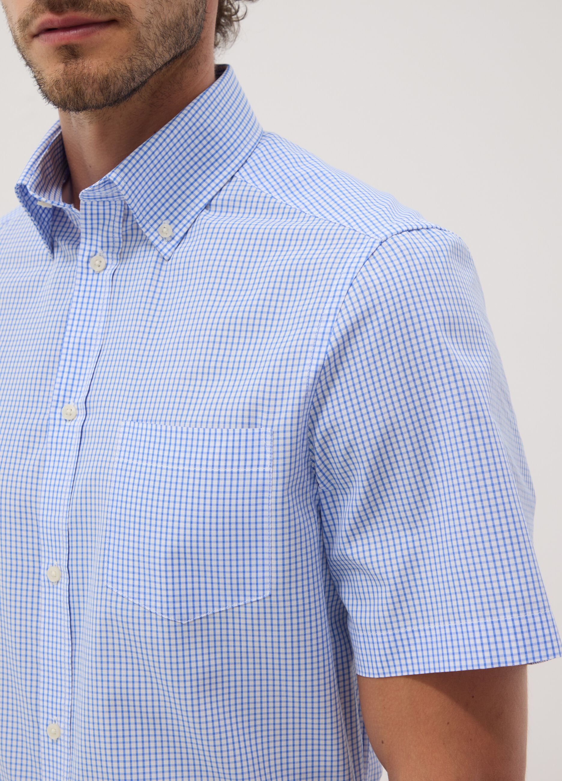 Light blue short-sleeve button-down shirt