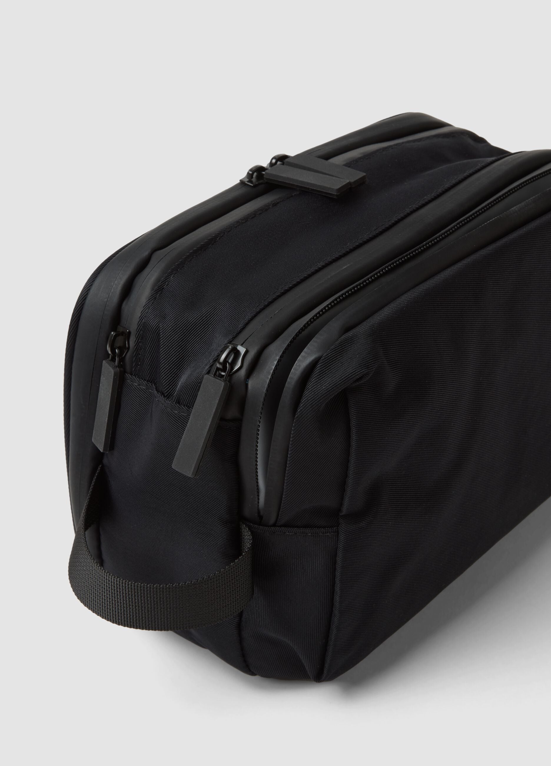 Black toiletry bag with double zip