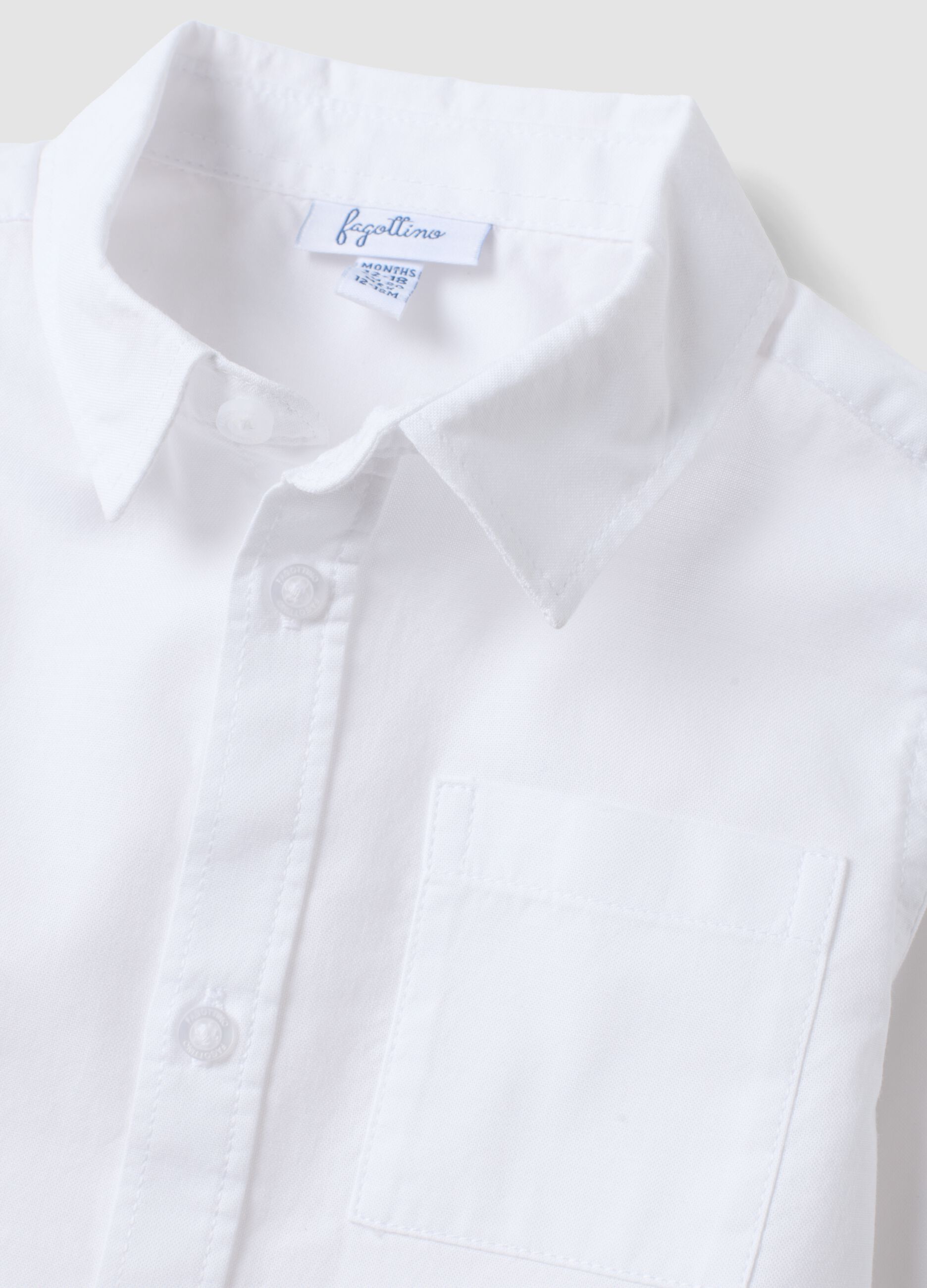 Camicia bianca in puro cotone con collo classico e taschino per bimbo