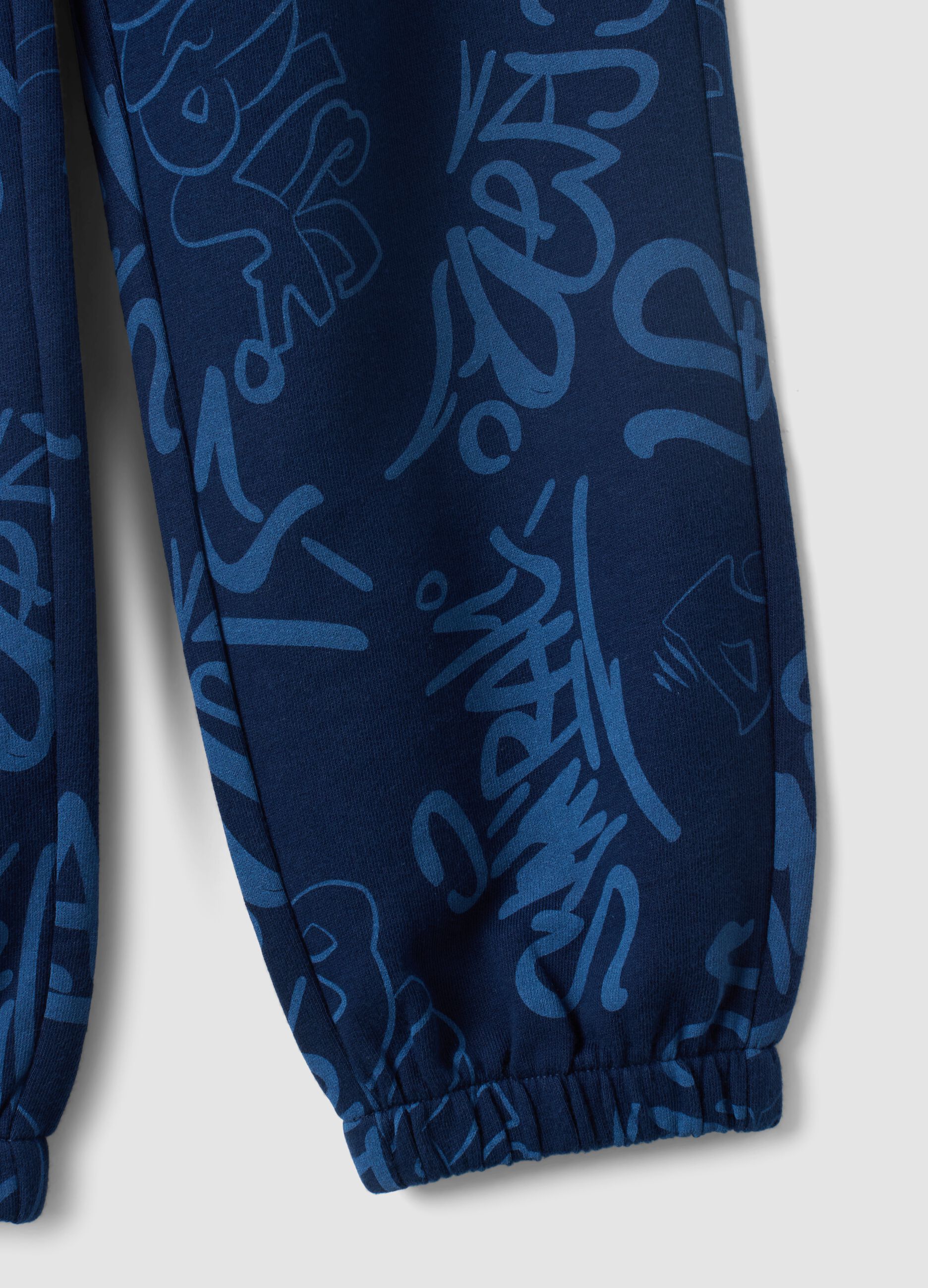 Blue oversized pure cotton all-over print jogger trousers for boys