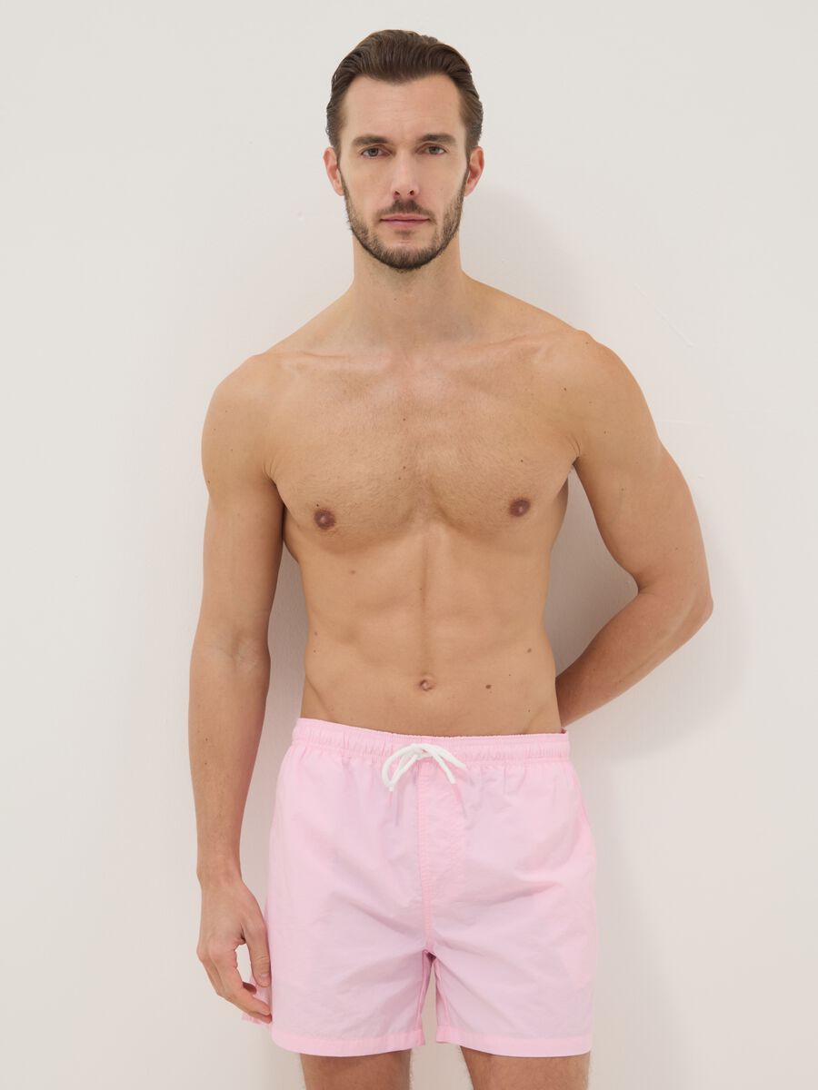 Pink swim shorts with elasticated waist_0