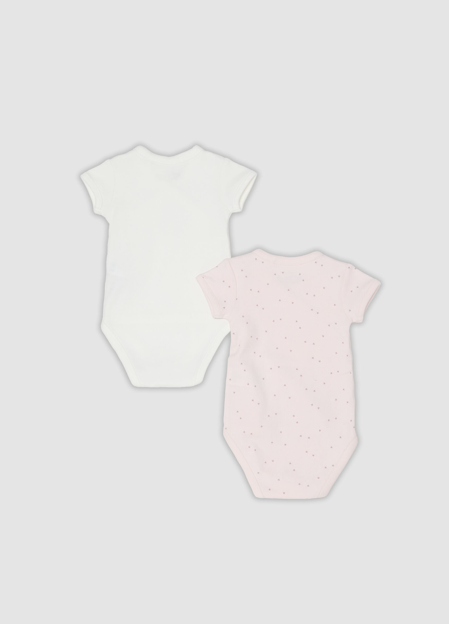 Two-pack of pink and white organic cotton short-sleeve bodysuits for baby girls