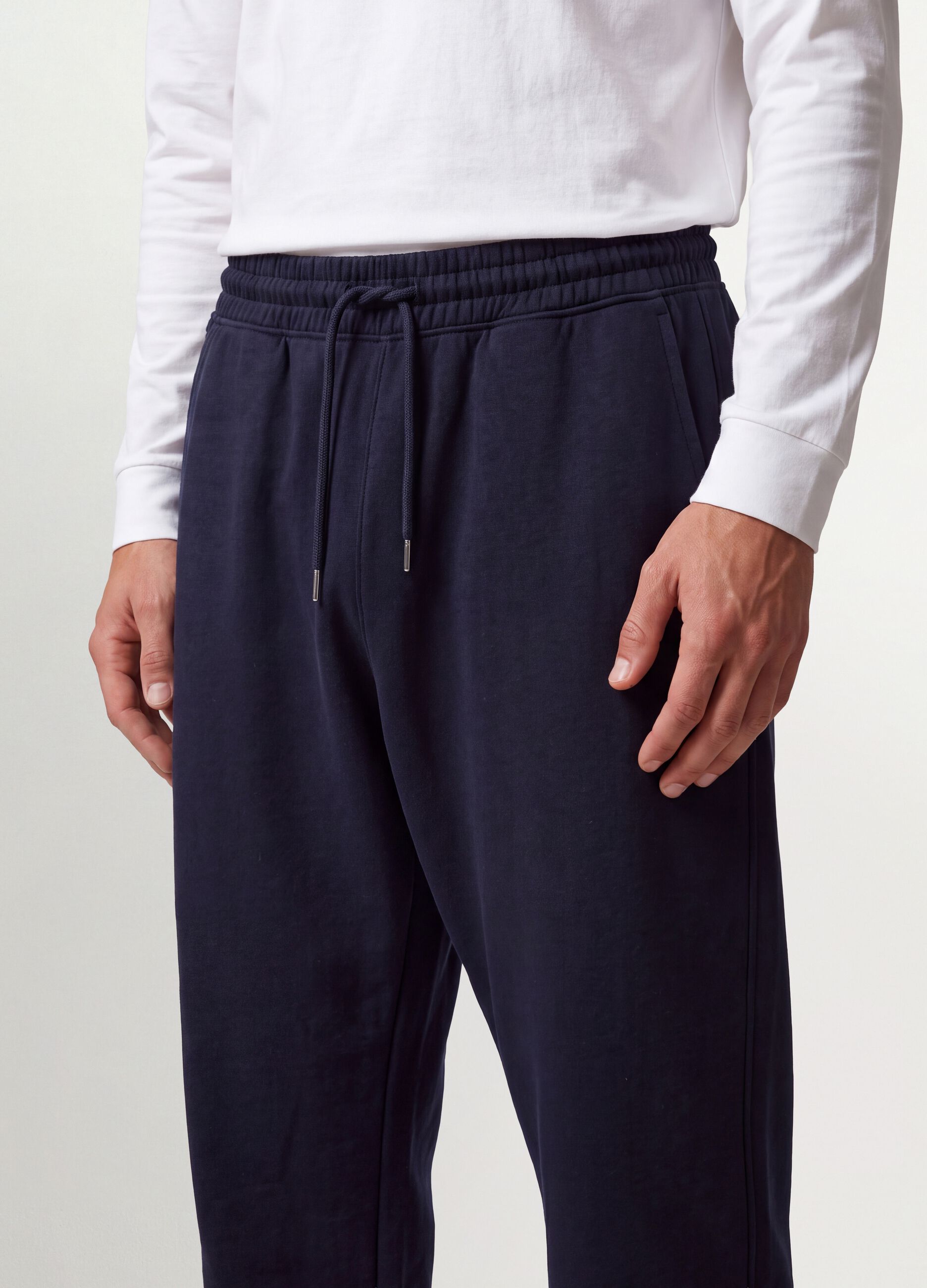 Blue cotton-blend joggers with cuffed hem and drawstring
