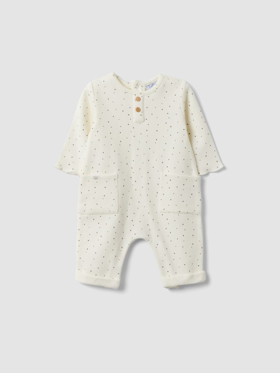 White organic cotton baby romper with buttons and pattern_0