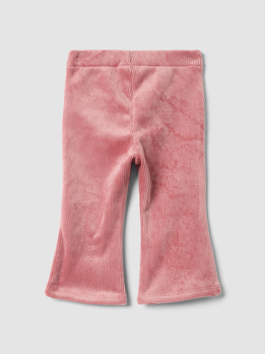 Pantaloni flare rosa in tessuto elasticizzato a costine_1