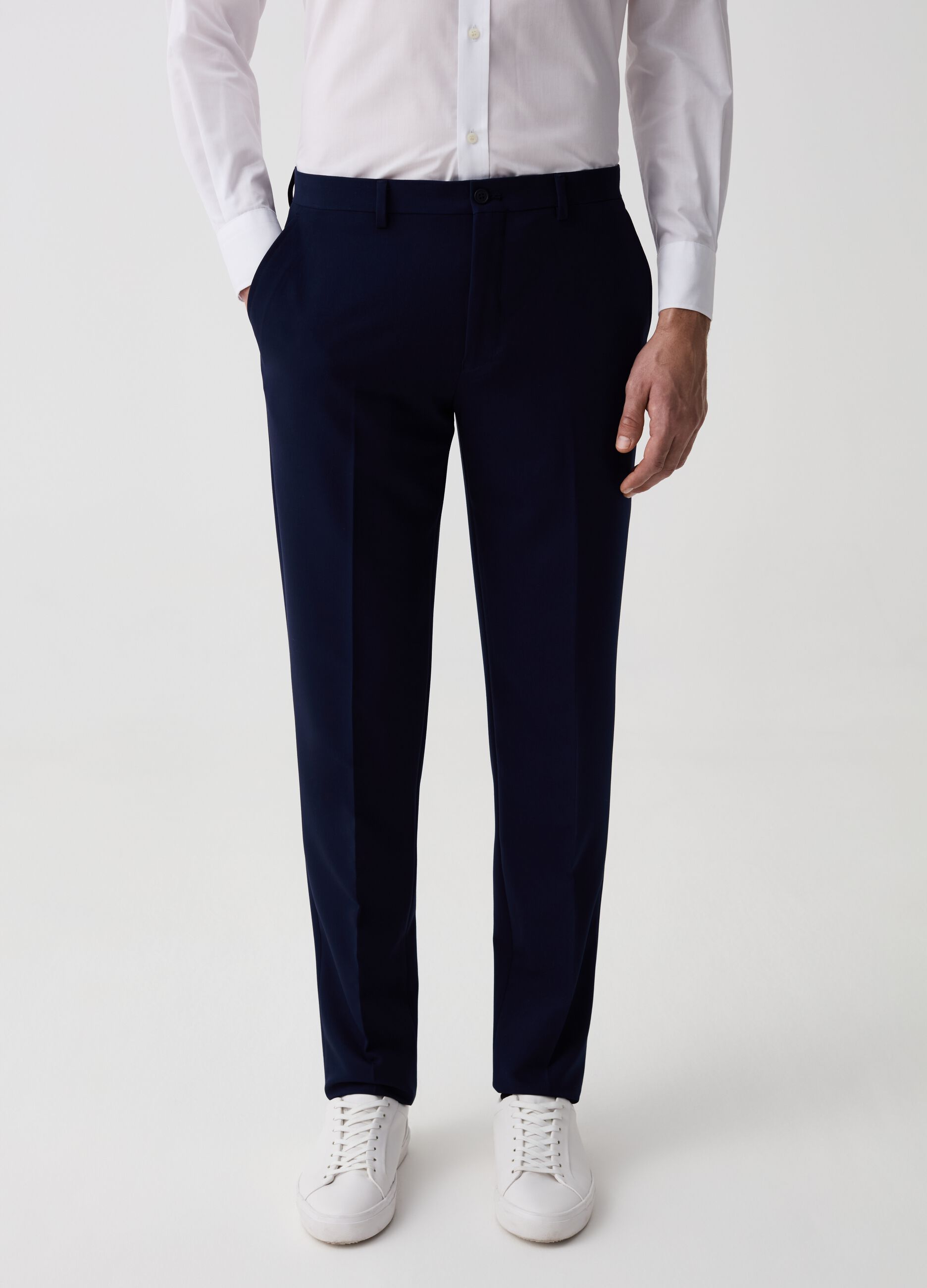 Solid colour slim-fit trousers