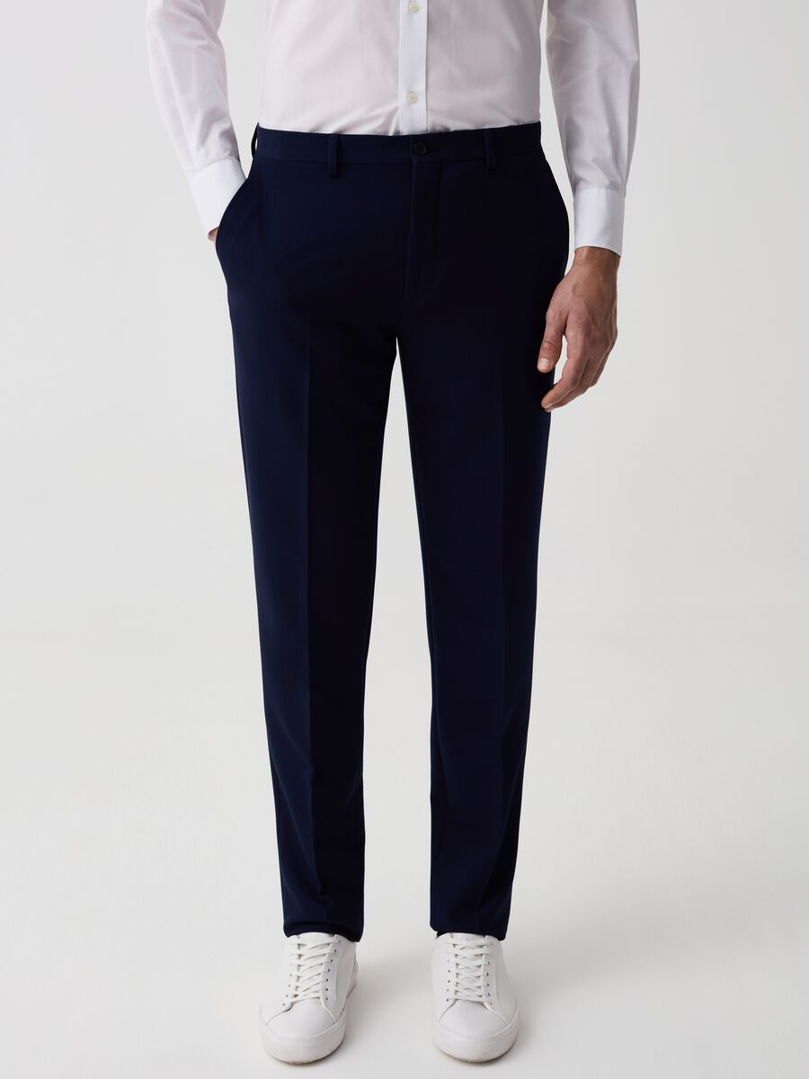 Solid colour slim-fit trousers_1