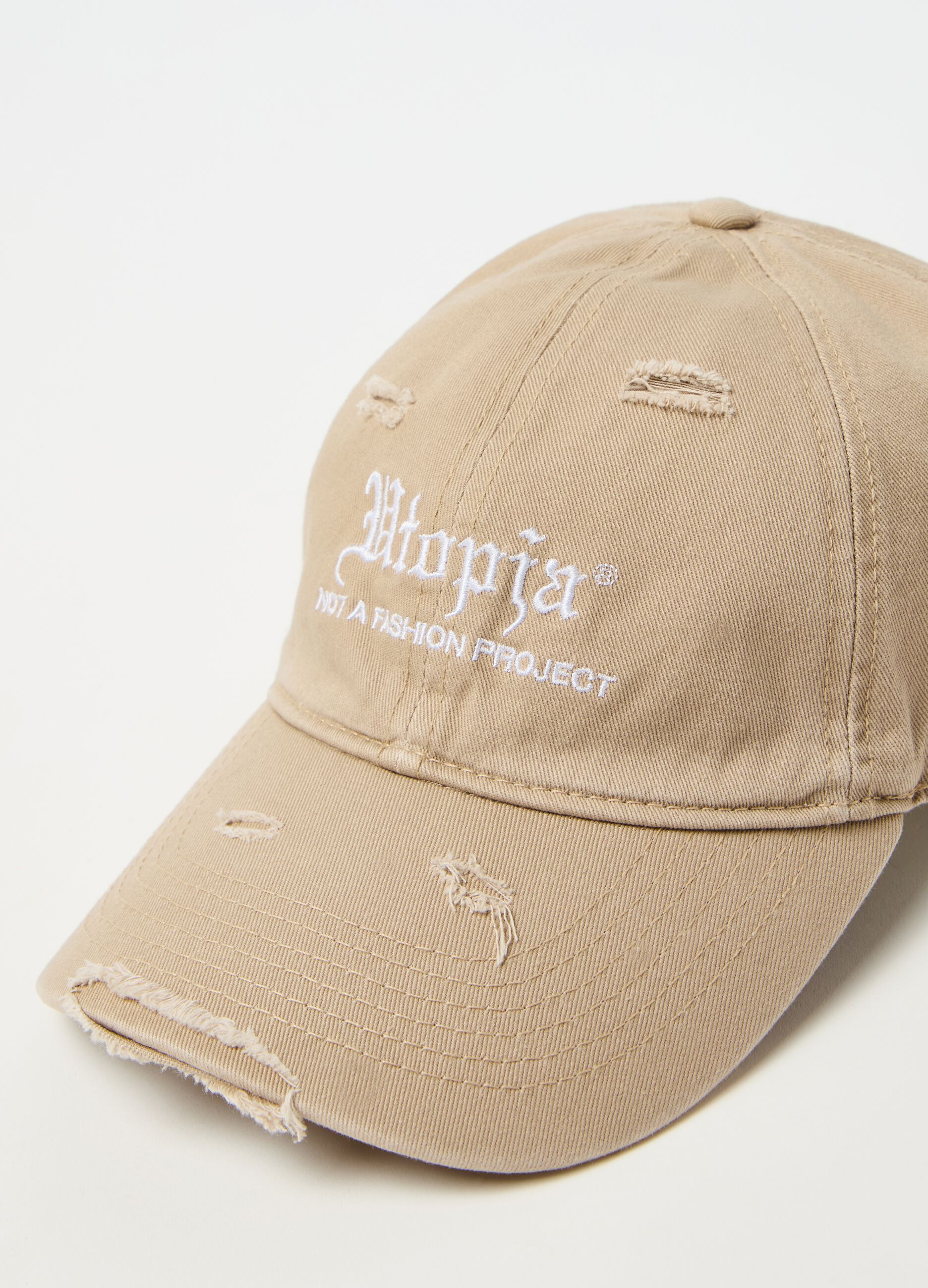 Baseball cap with abrasions