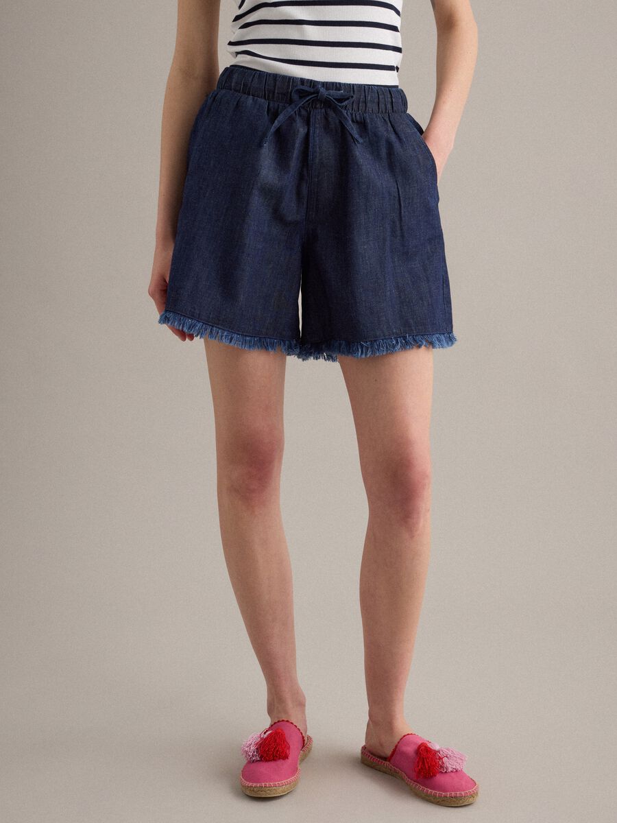 Blue cotton-blend denim shorts, regular fit with frayed hem_1