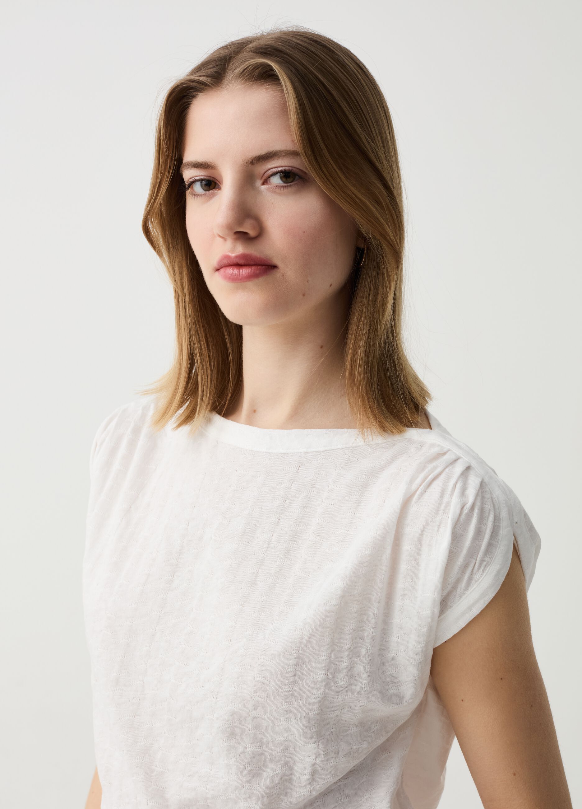 Sleeveless top in jersey with woven texture