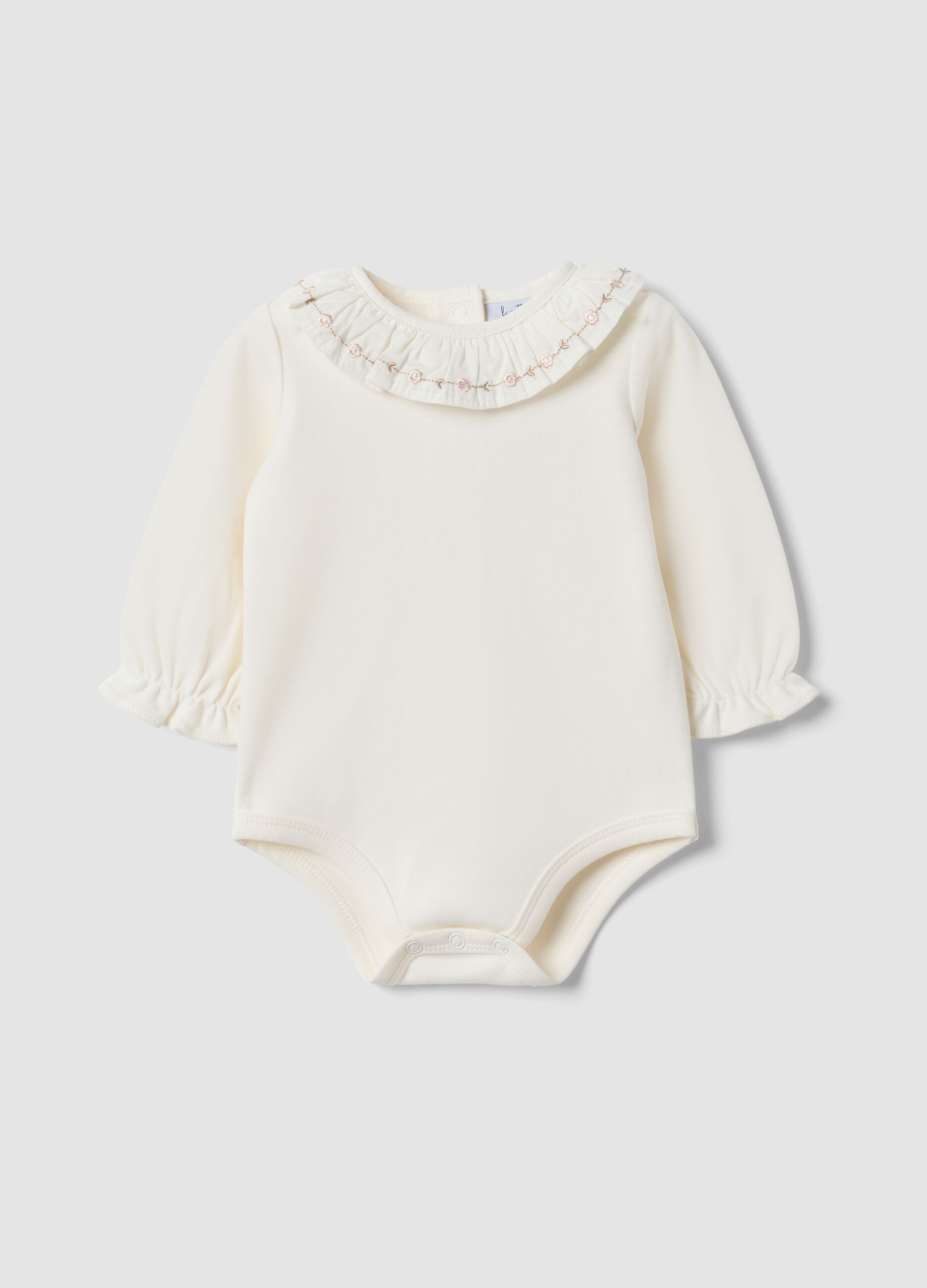 Body bianco in puro cotone organico con colletto ricamato per neonata
