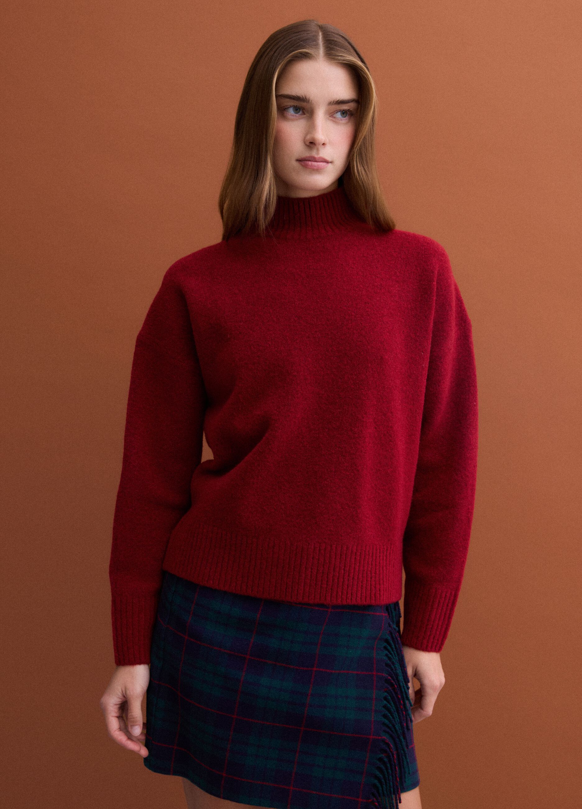 Red stretch wool jumper with raised neck