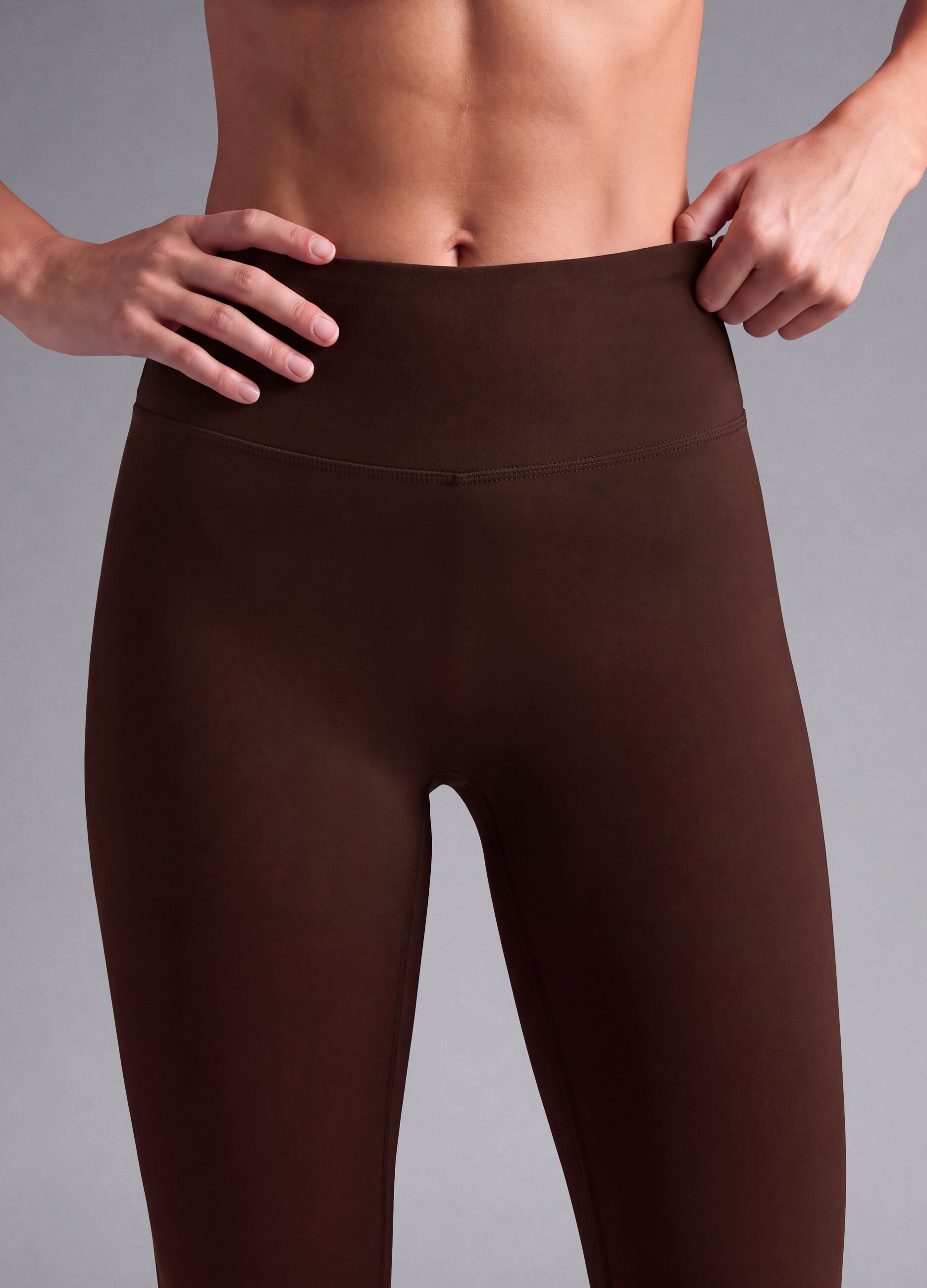 Brown high-waisted stretch leggings