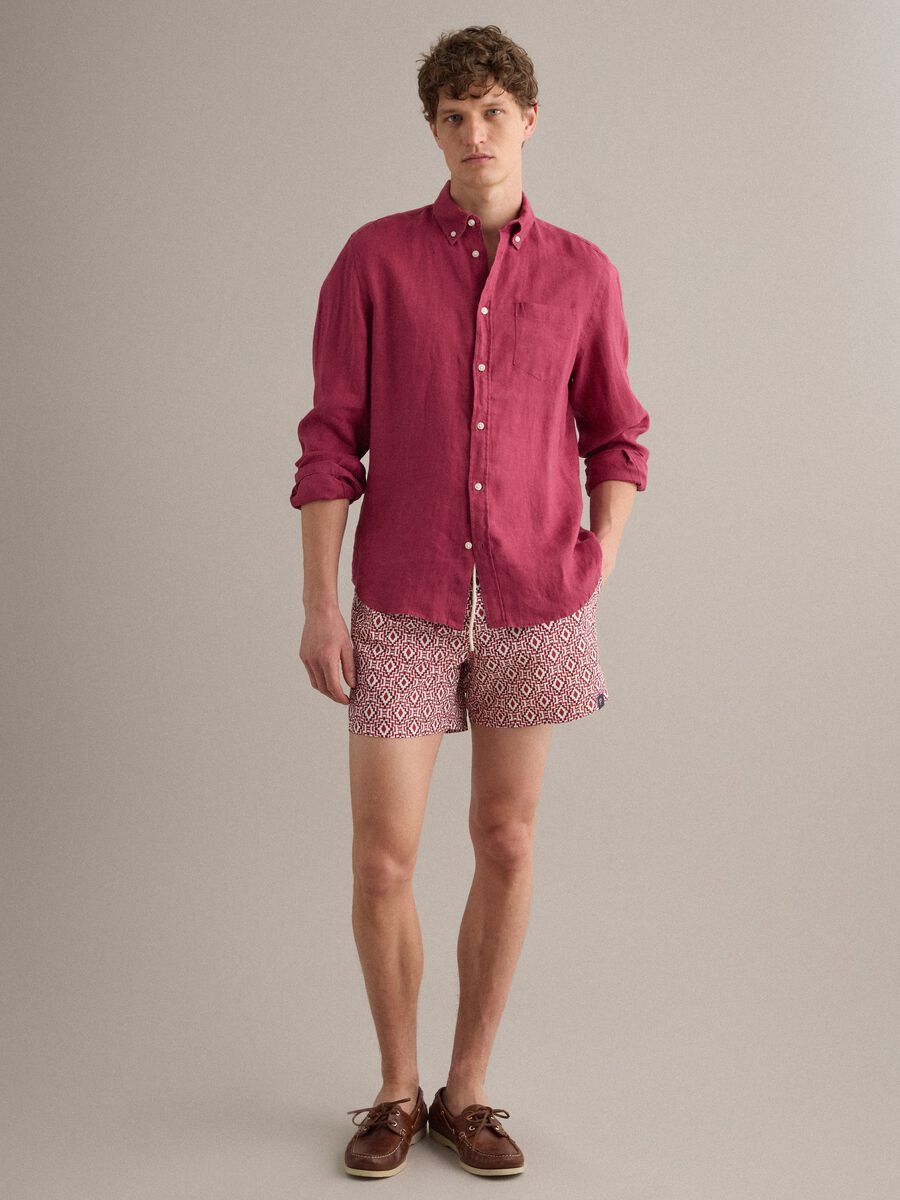 Red swim shorts with geometric print_2