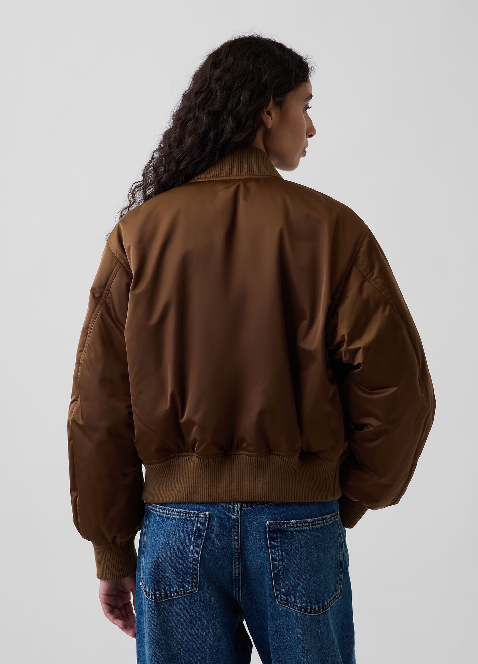 Light brown bomber jacket with zip and ribbed cuffs