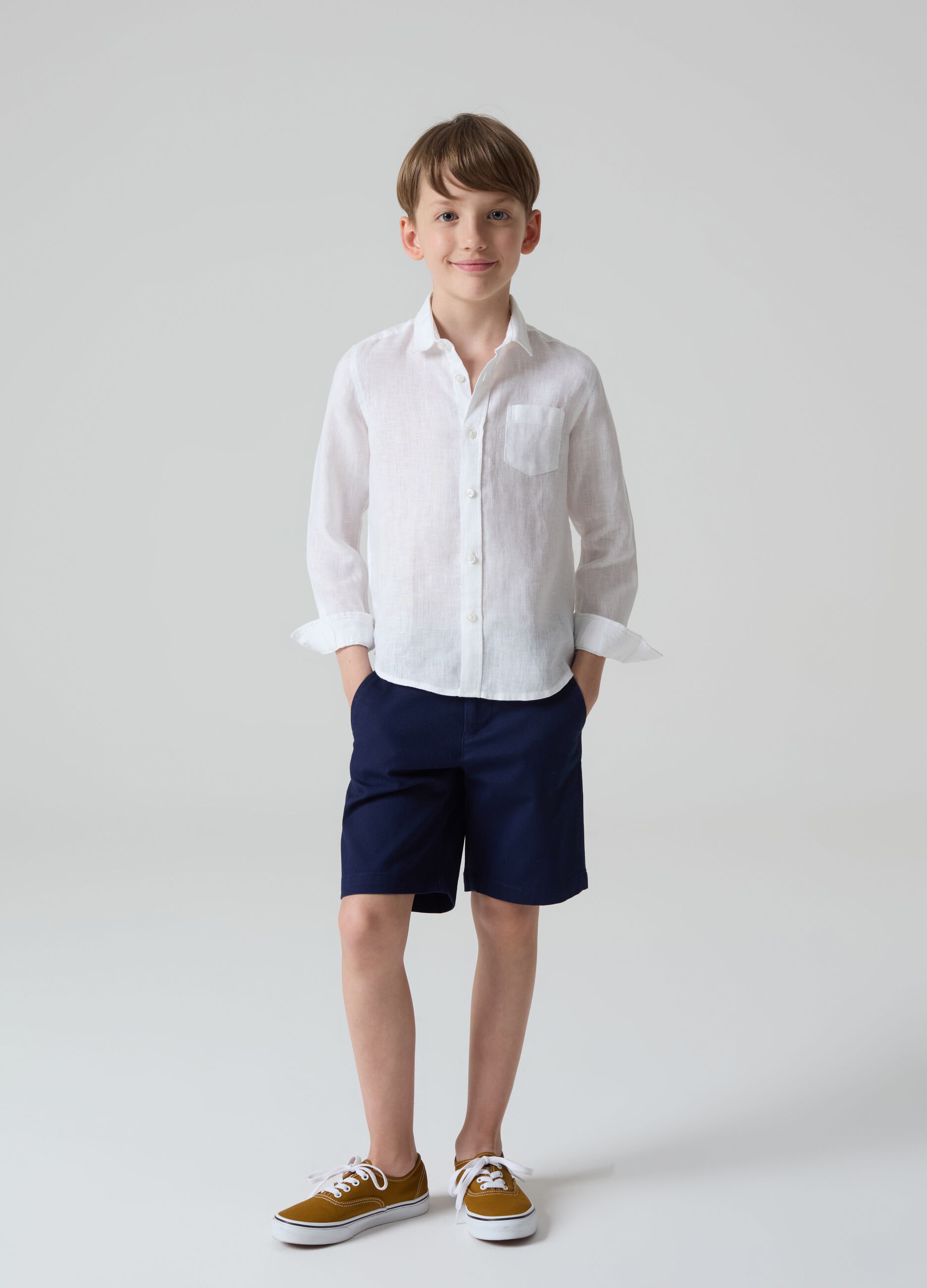 Stretch cotton Bermuda shorts with pockets