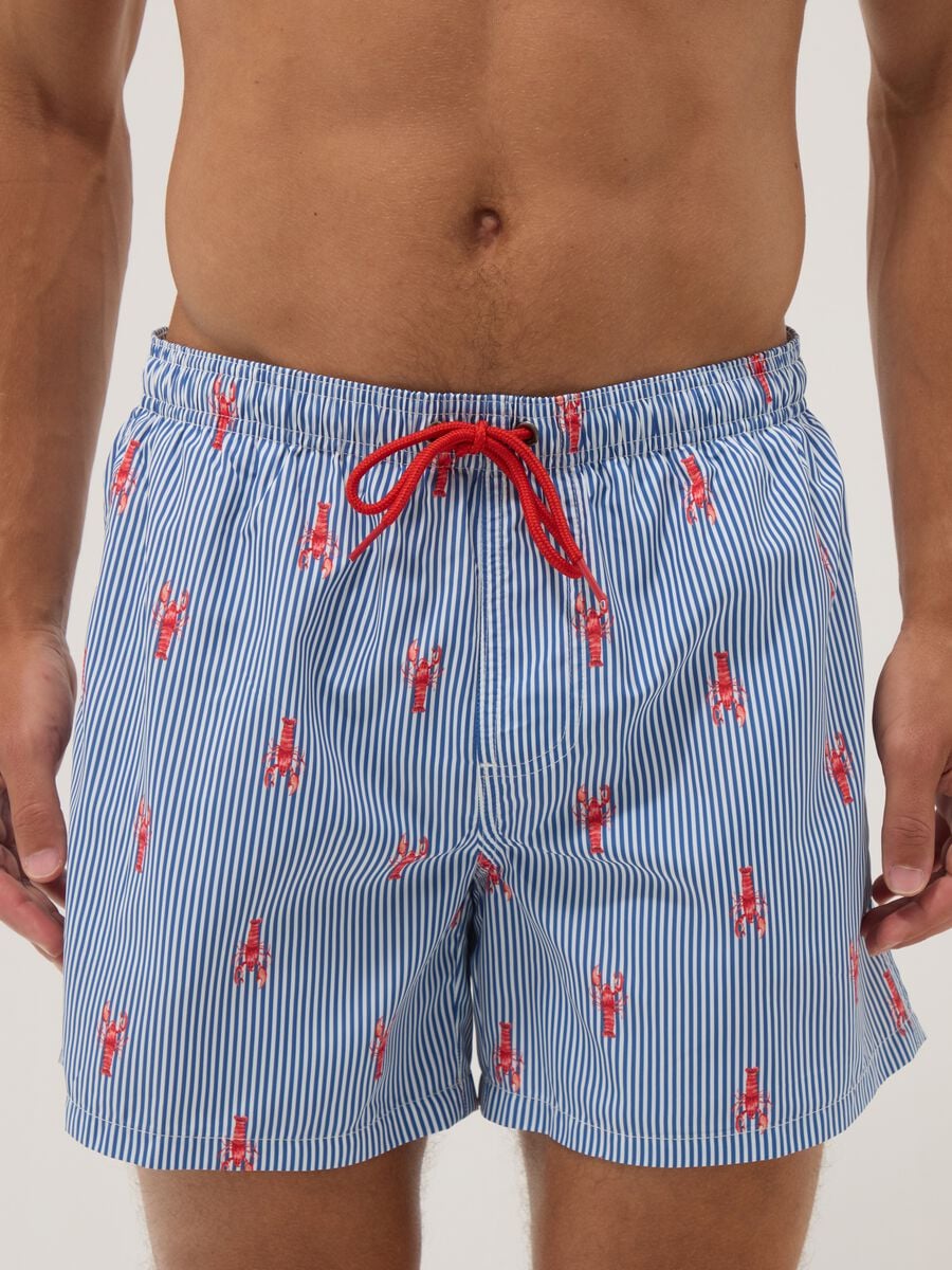 Blue striped swim shorts with lobster print_1