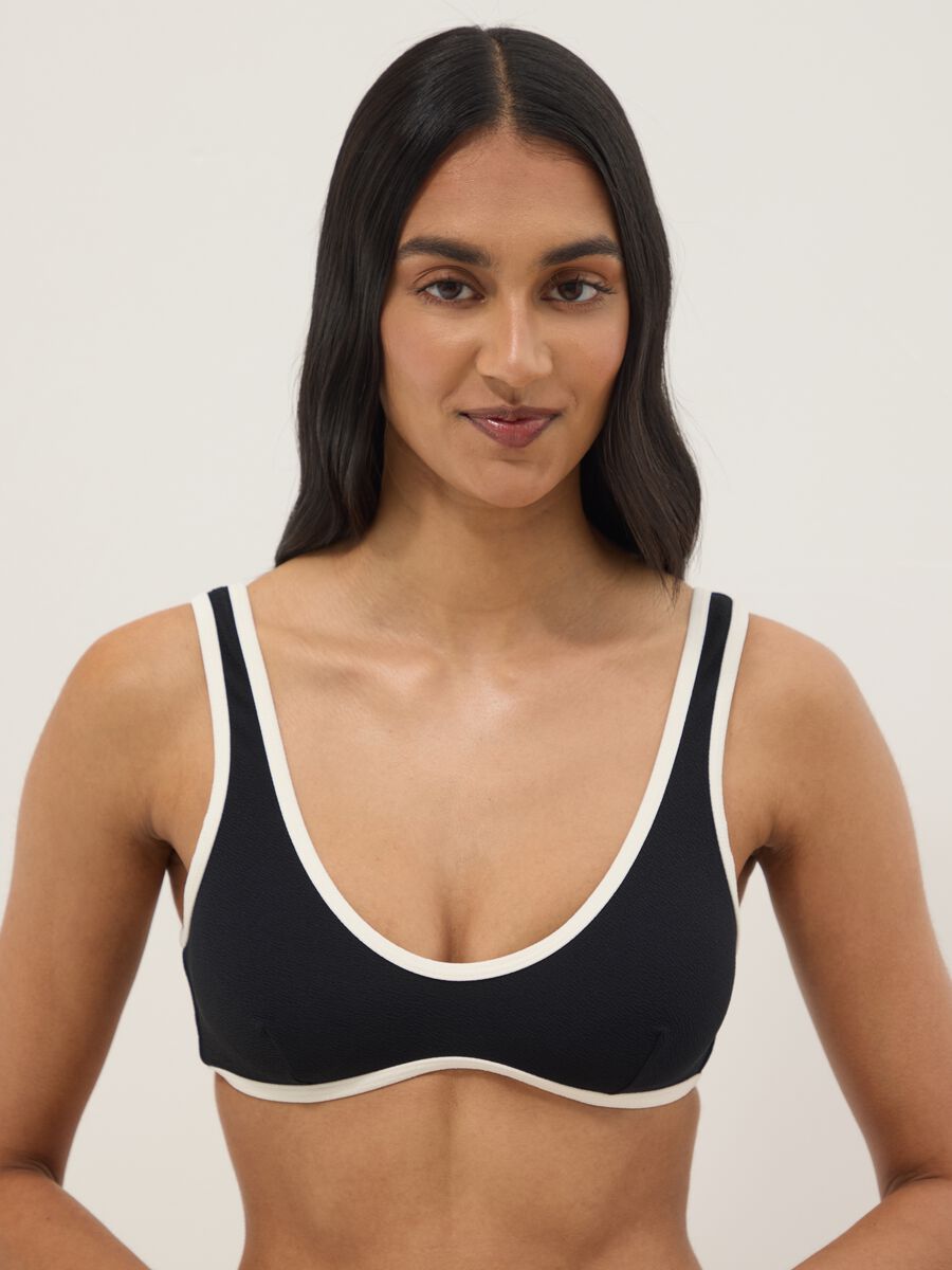 Black stretch fabric bikini top with white trim_0